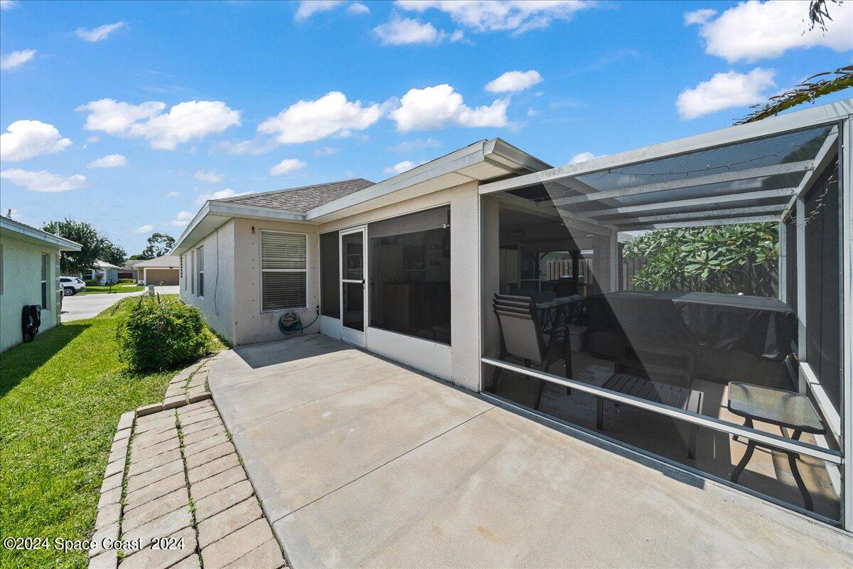 4850 Decatur Circle Melbourne, FL 32934 - Photo 35 of 35 a view of a house with backyard and porch