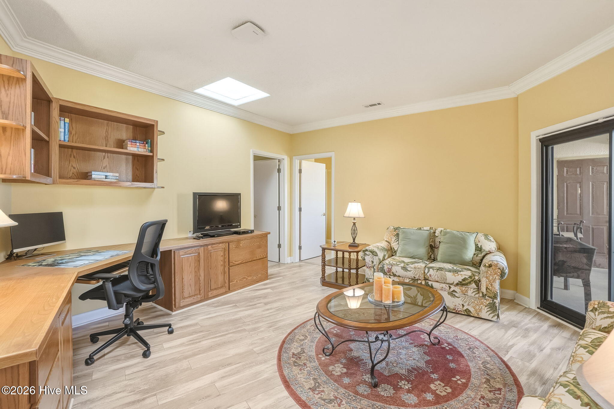 1505 Salter Path Road, Unit 603J Indian Beach, NC 28512 - Photo 20 of 50 East Wing Den/Office or Media Room with private entrance to the balcony looking toward the west wing principal suite