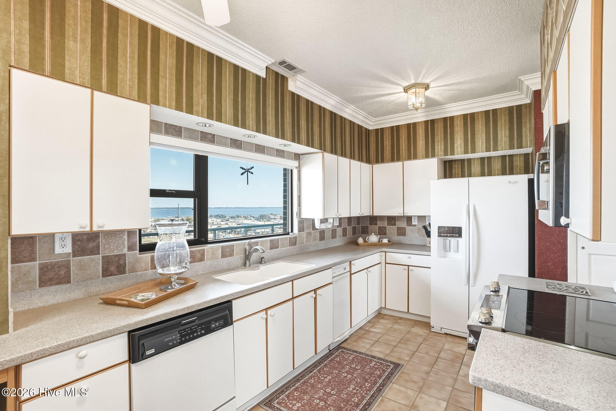 1505 Salter Path Road, Unit 603J Indian Beach, NC 28512 - Photo 8 of 50 What a great kitchen to look out over Bogue Sound as you prep for entertaining family and friends!