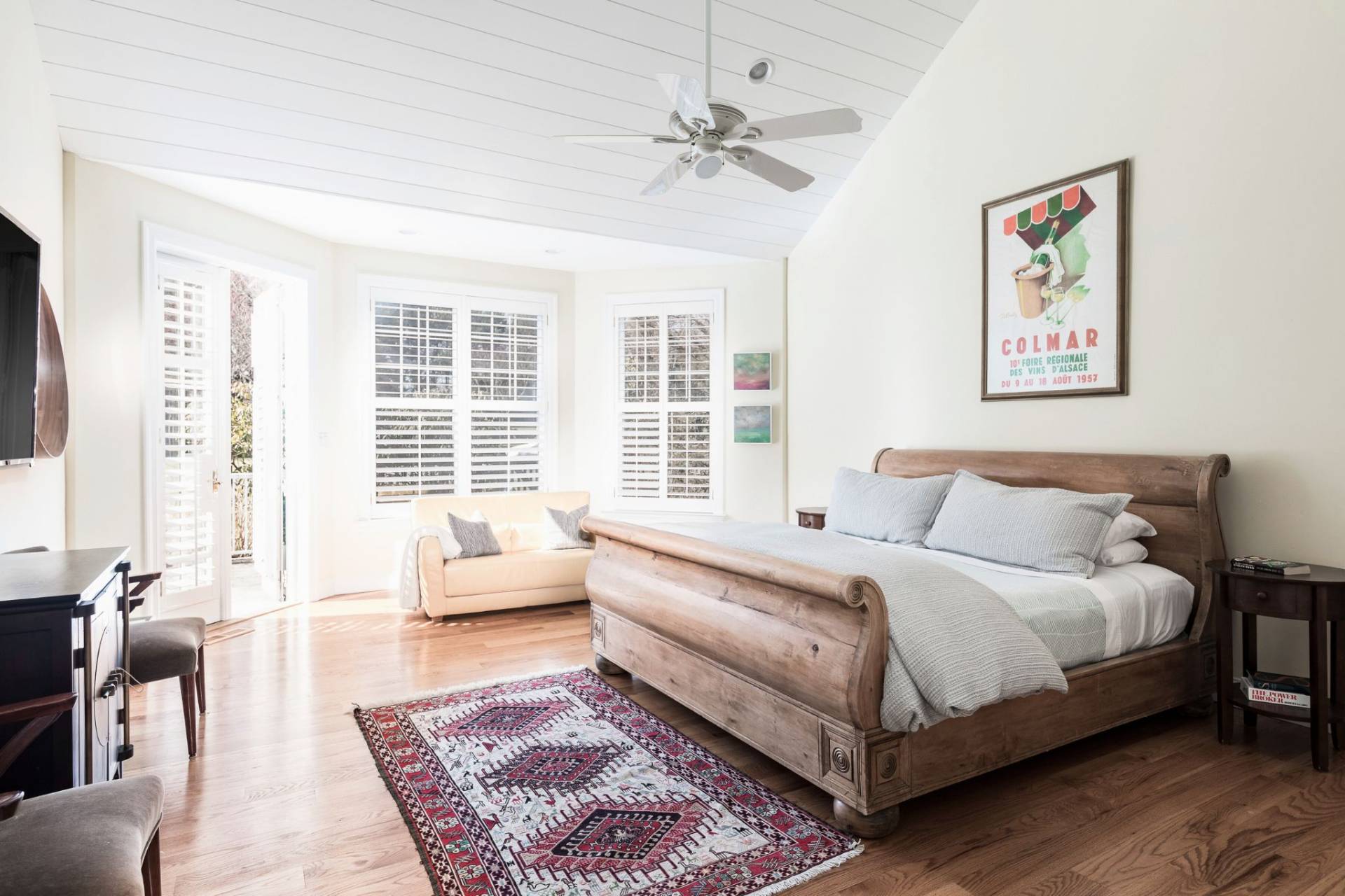 99 Flying Point Road Southampton, NY 11968 - Photo 12 of 20 a bedroom with a large bed couch and a window