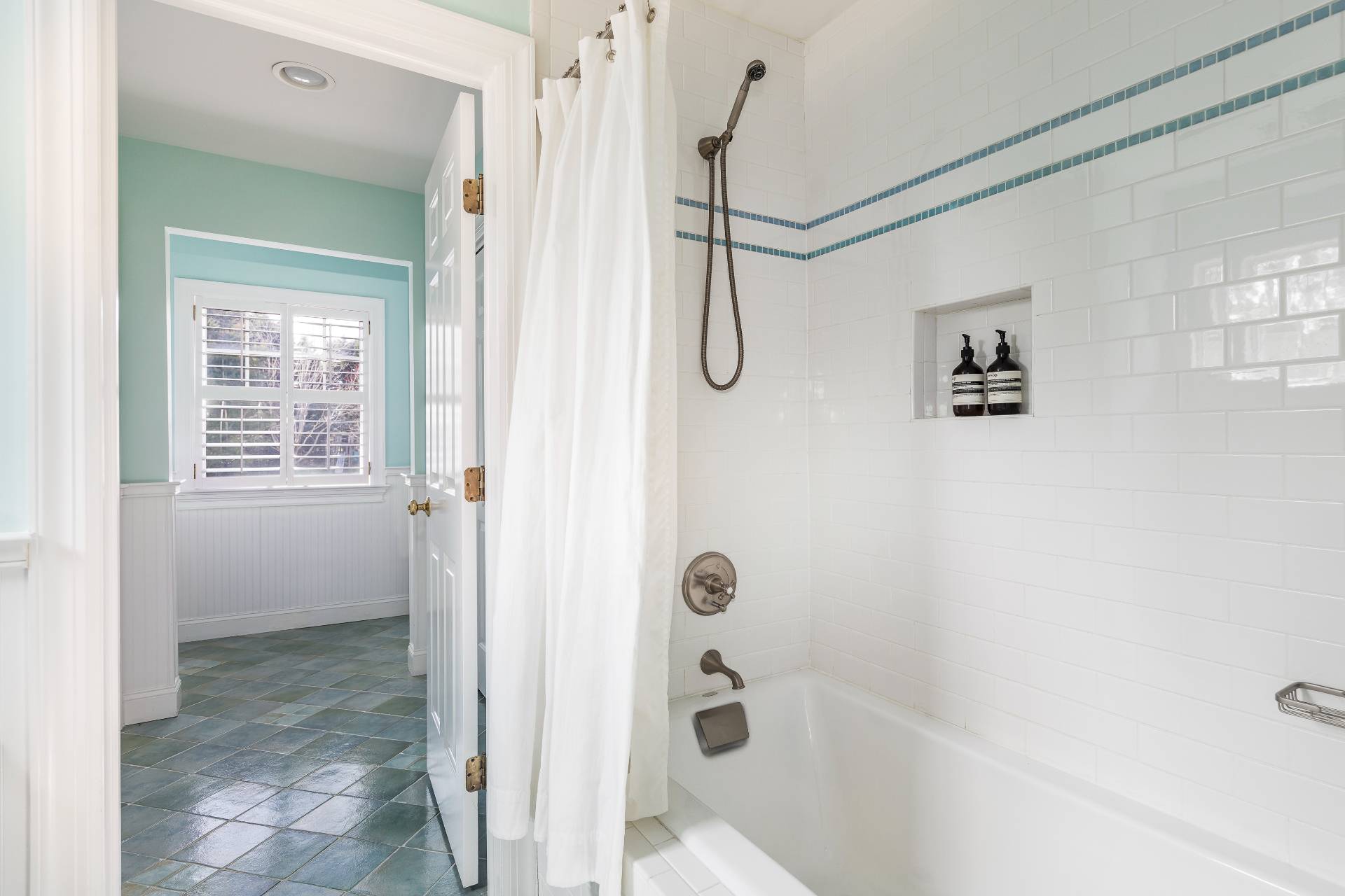 99 Flying Point Road Southampton, NY 11968 - Photo 17 of 20 a bathroom with a bathtub and a shower