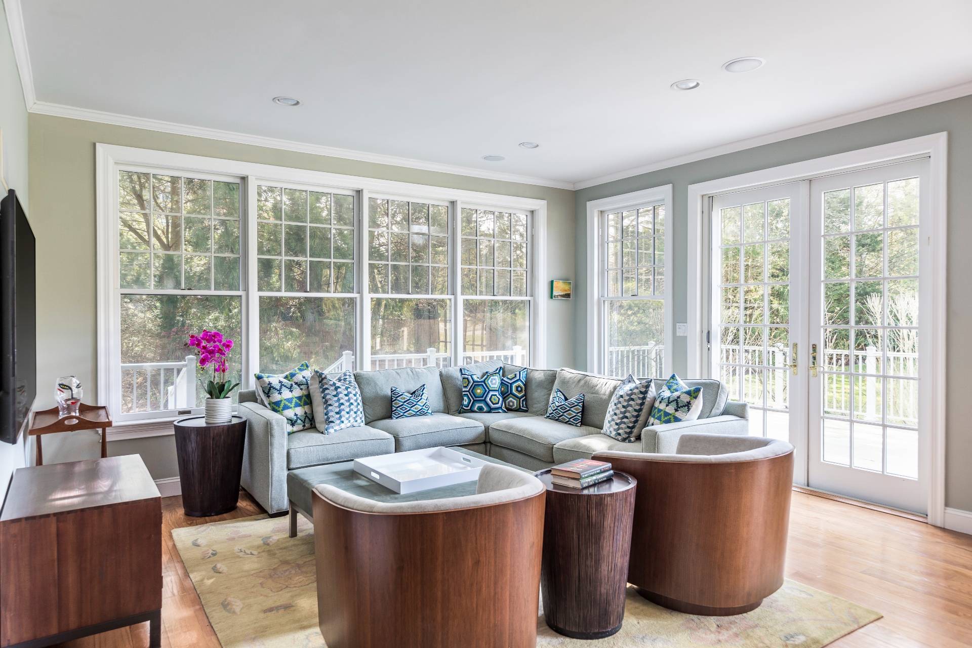 99 Flying Point Road Southampton, NY 11968 - Photo 9 of 20 a living room with furniture and a large window