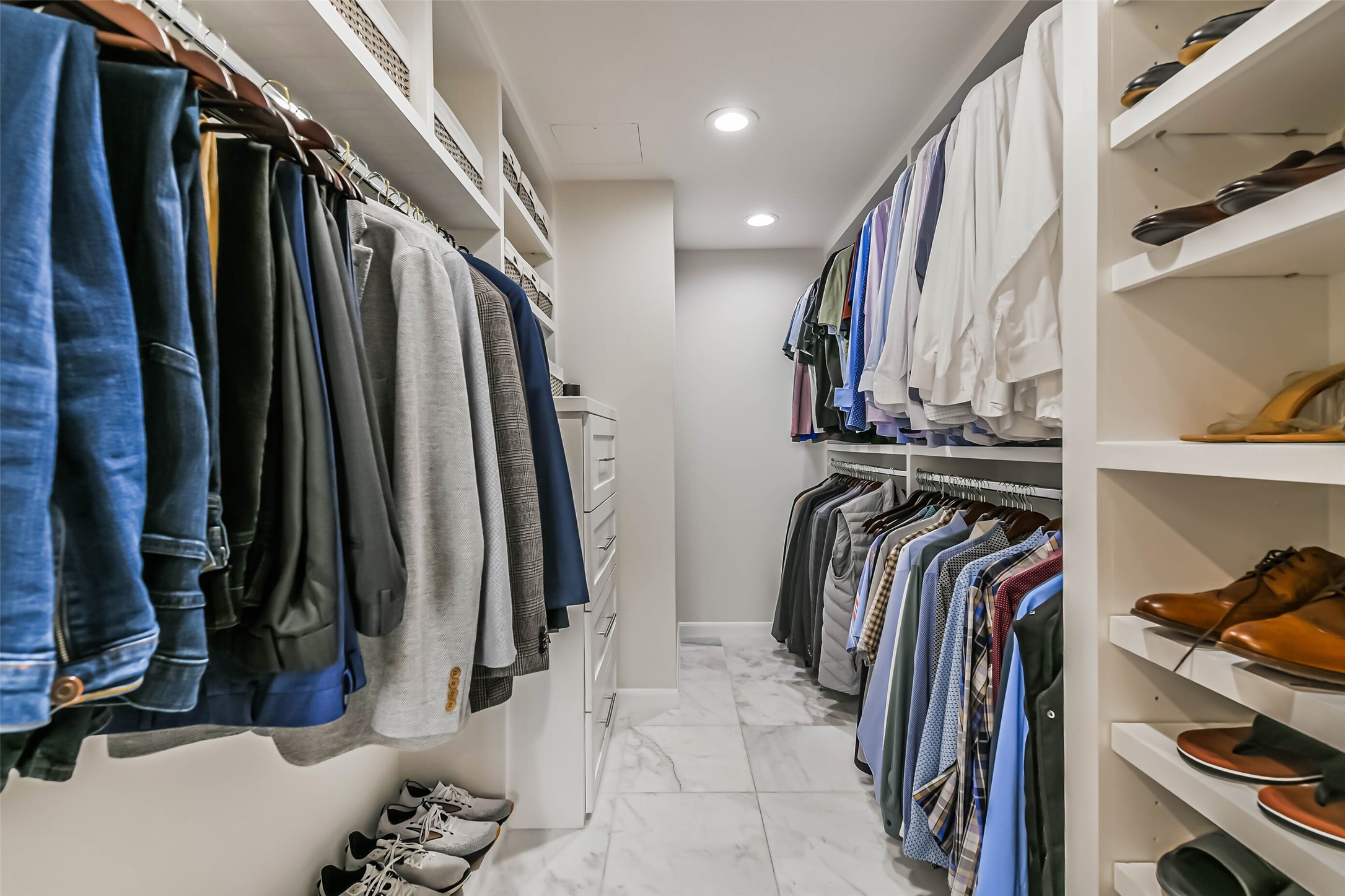 14 Greenway Plaza, Unit 15P Houston, TX 77046 - Photo 13 of 25 a view of walk in closet with clothes and shoes