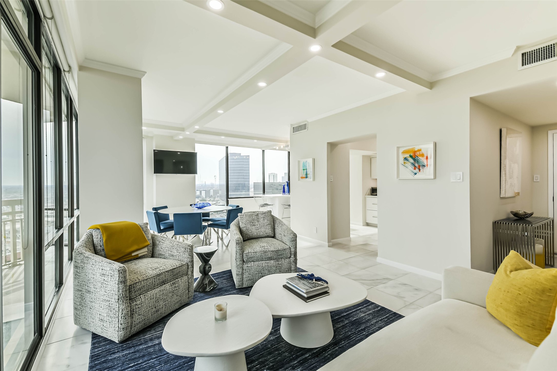 14 Greenway Plaza, Unit 15P Houston, TX 77046 - Photo 3 of 25 a living room with furniture and a large window