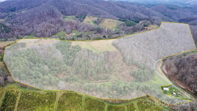 a view of swimming pool from a lake view