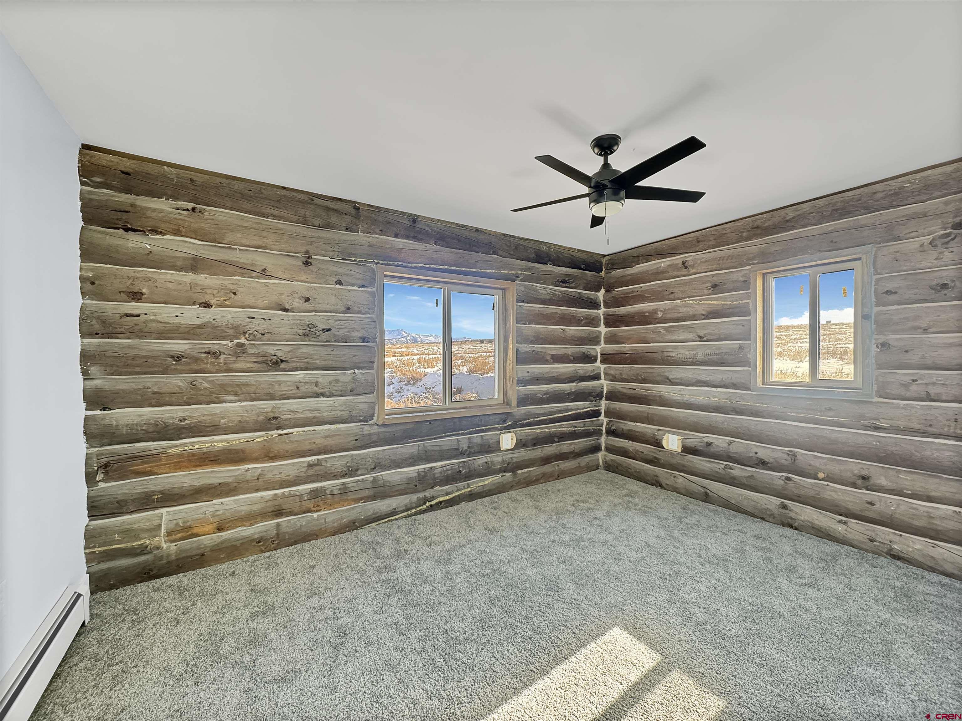 6313 Sagebrush Road Hotchkiss, CO 81419 - Photo 14 of 34 a view of room with a ceiling fan
