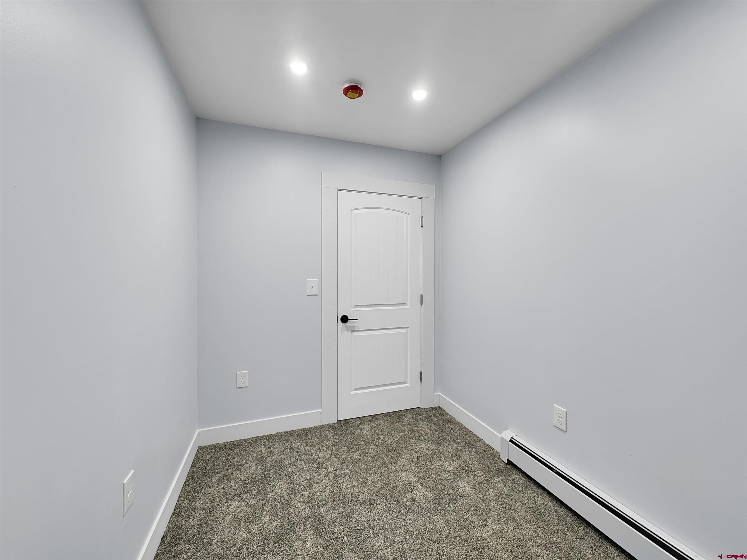 6313 Sagebrush Road Hotchkiss, CO 81419 - Photo 18 of 34 an empty room with a workbench