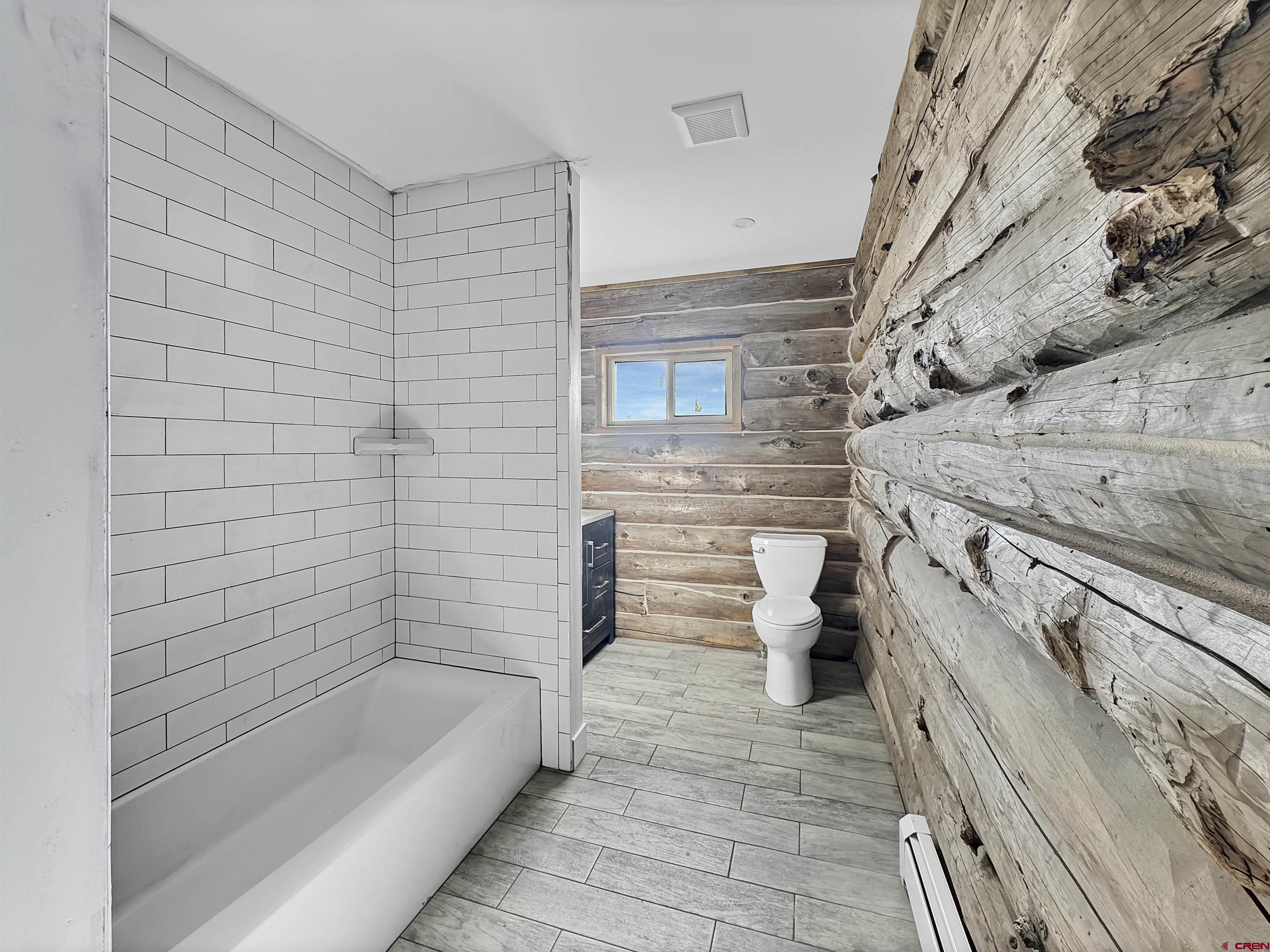 6313 Sagebrush Road Hotchkiss, CO 81419 - Photo 19 of 34 a bathroom with a bathtub and shower