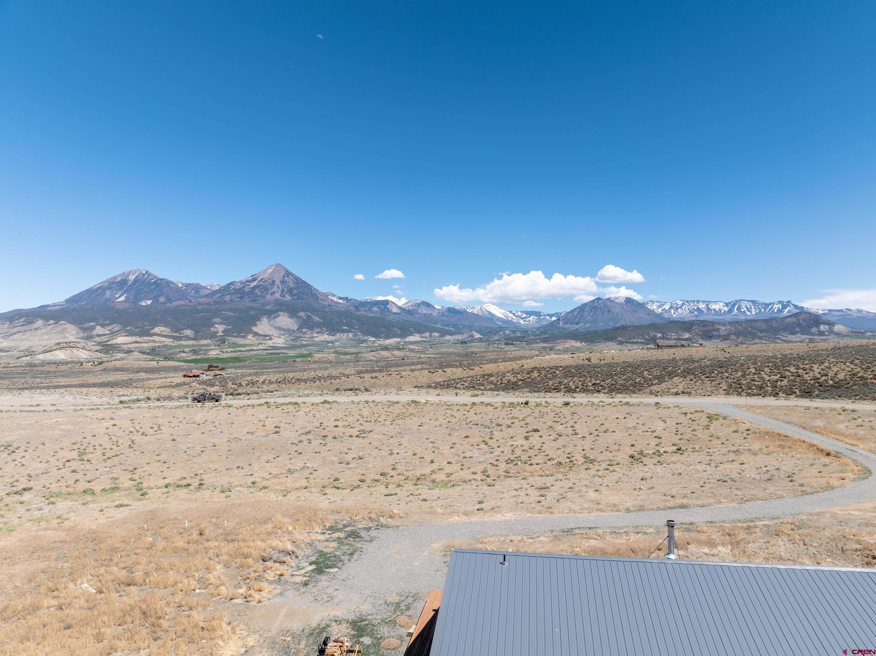 6313 Sagebrush Road Hotchkiss, CO 81419 - Photo 31 of 34 a view of beach and ocean