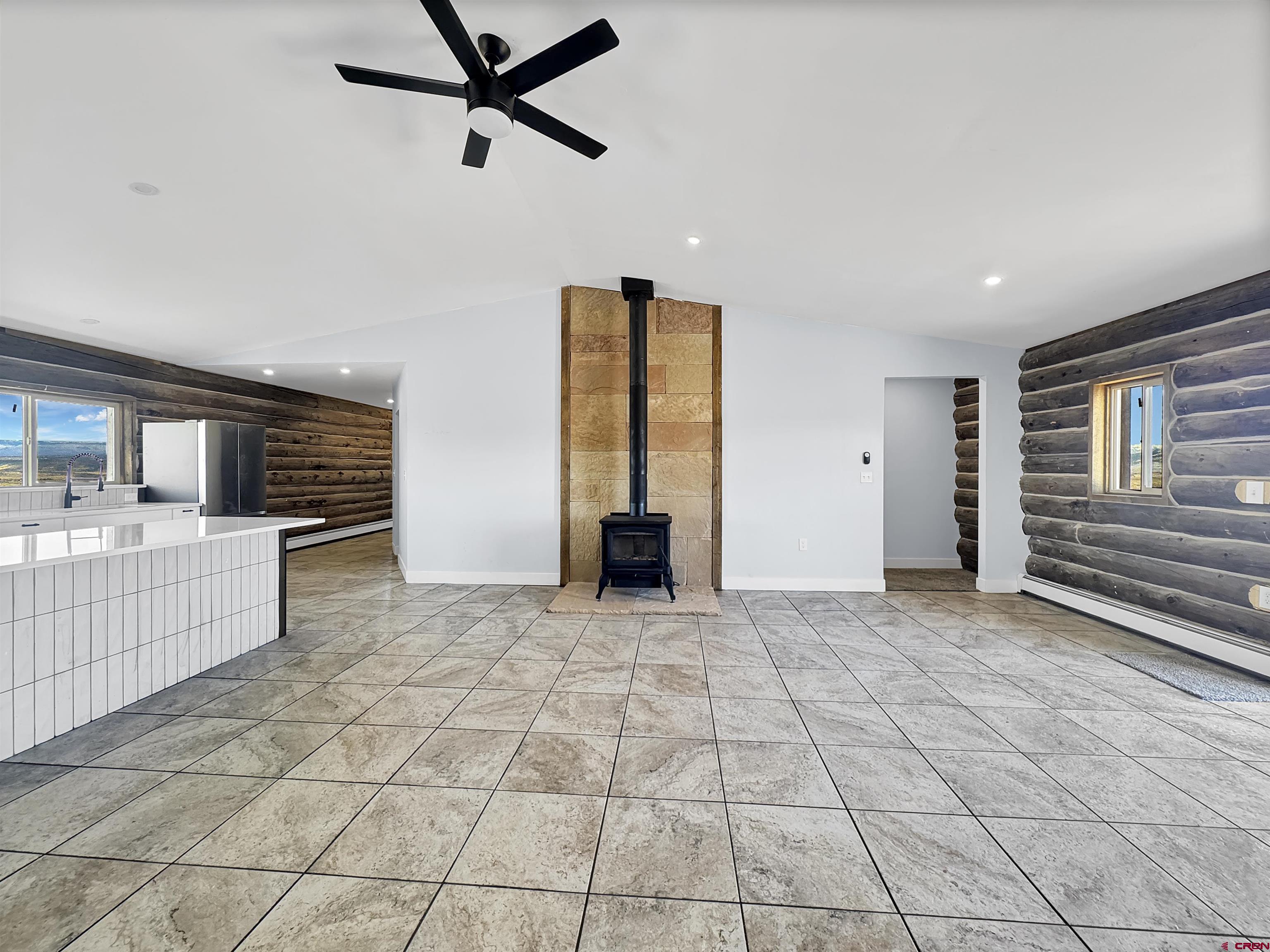 6313 Sagebrush Road Hotchkiss, CO 81419 - Photo 6 of 34 a view of a livingroom with a staircase