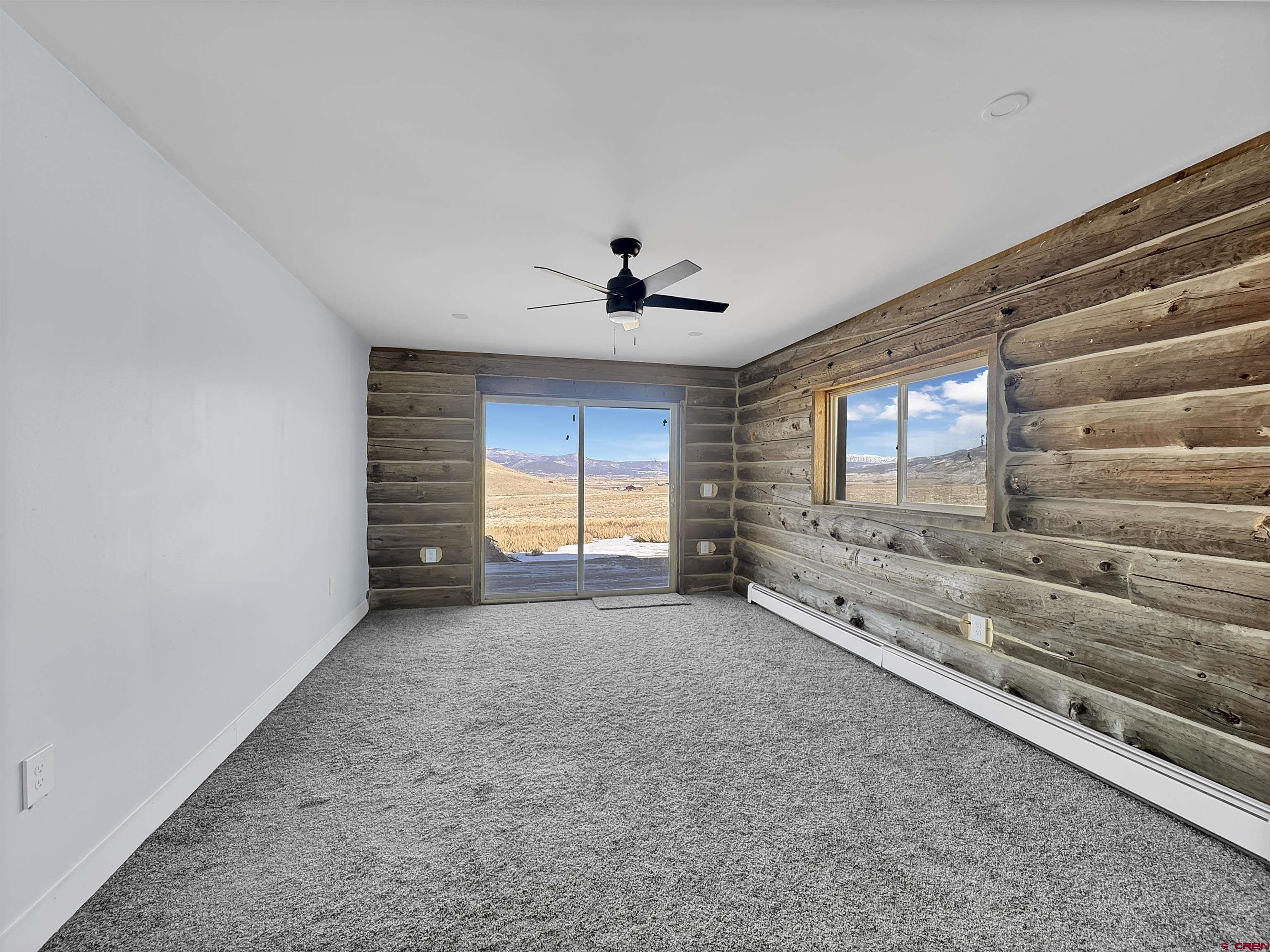 6313 Sagebrush Road Hotchkiss, CO 81419 - Photo 8 of 34 a view of an empty room with a window