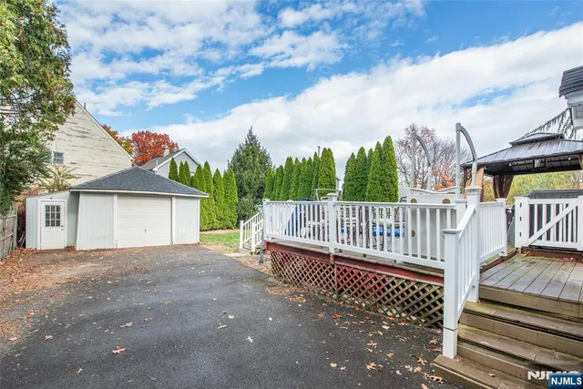 a view of a deck with a yard