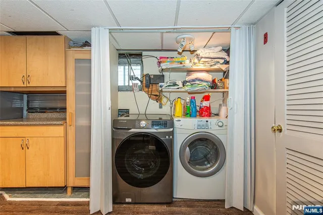 a storage room with washer and dryer