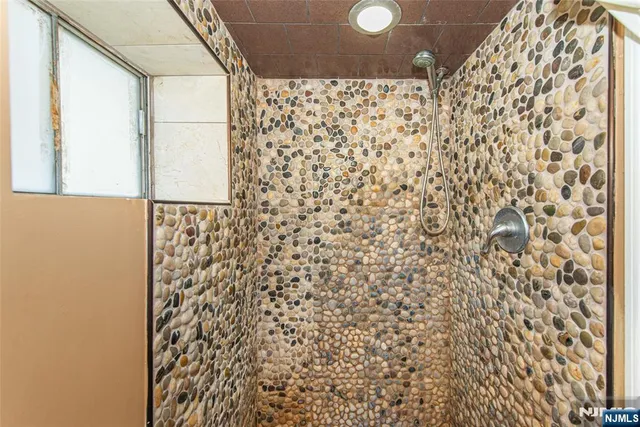 a bathroom with a shower curtain