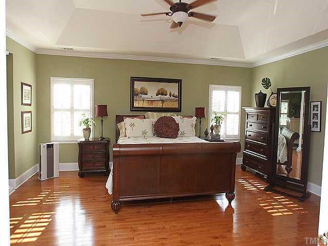 9508 Bluemont Court Raleigh, NC 27617 - Photo 7 of 10 a living room with furniture and a window