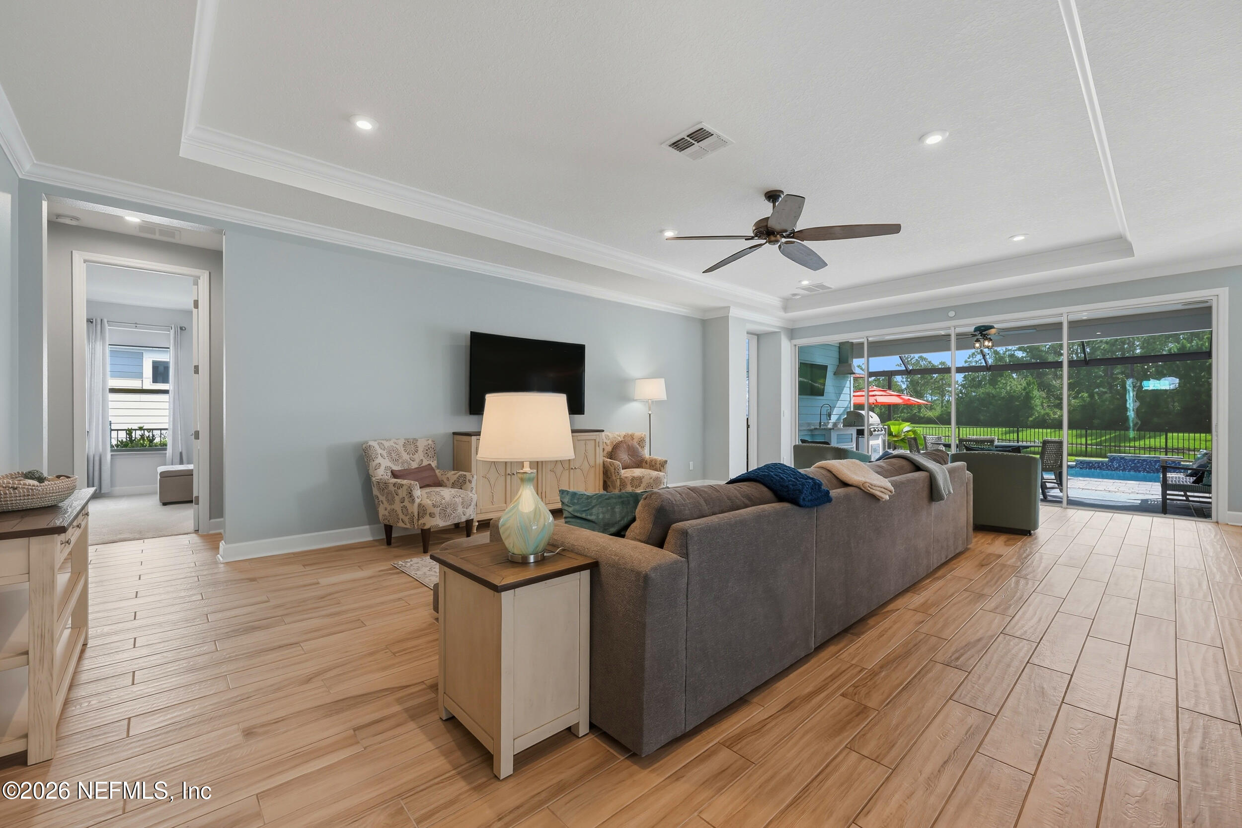 494 Marquesa Circle St. Johns, FL 32259 - Photo 11 of 76 a living room with furniture and a large window