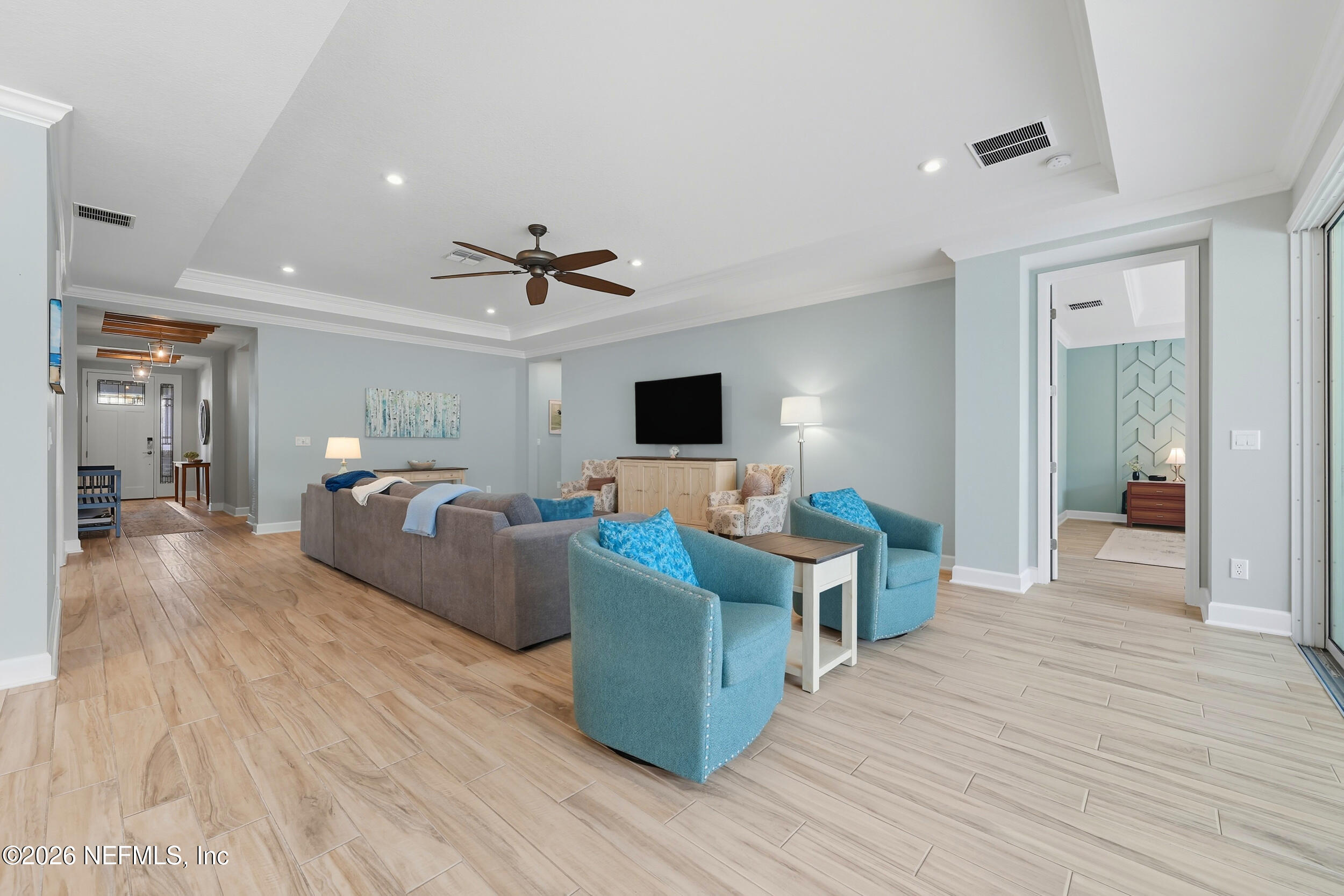 494 Marquesa Circle St. Johns, FL 32259 - Photo 13 of 76 a living room with furniture and a flat screen tv