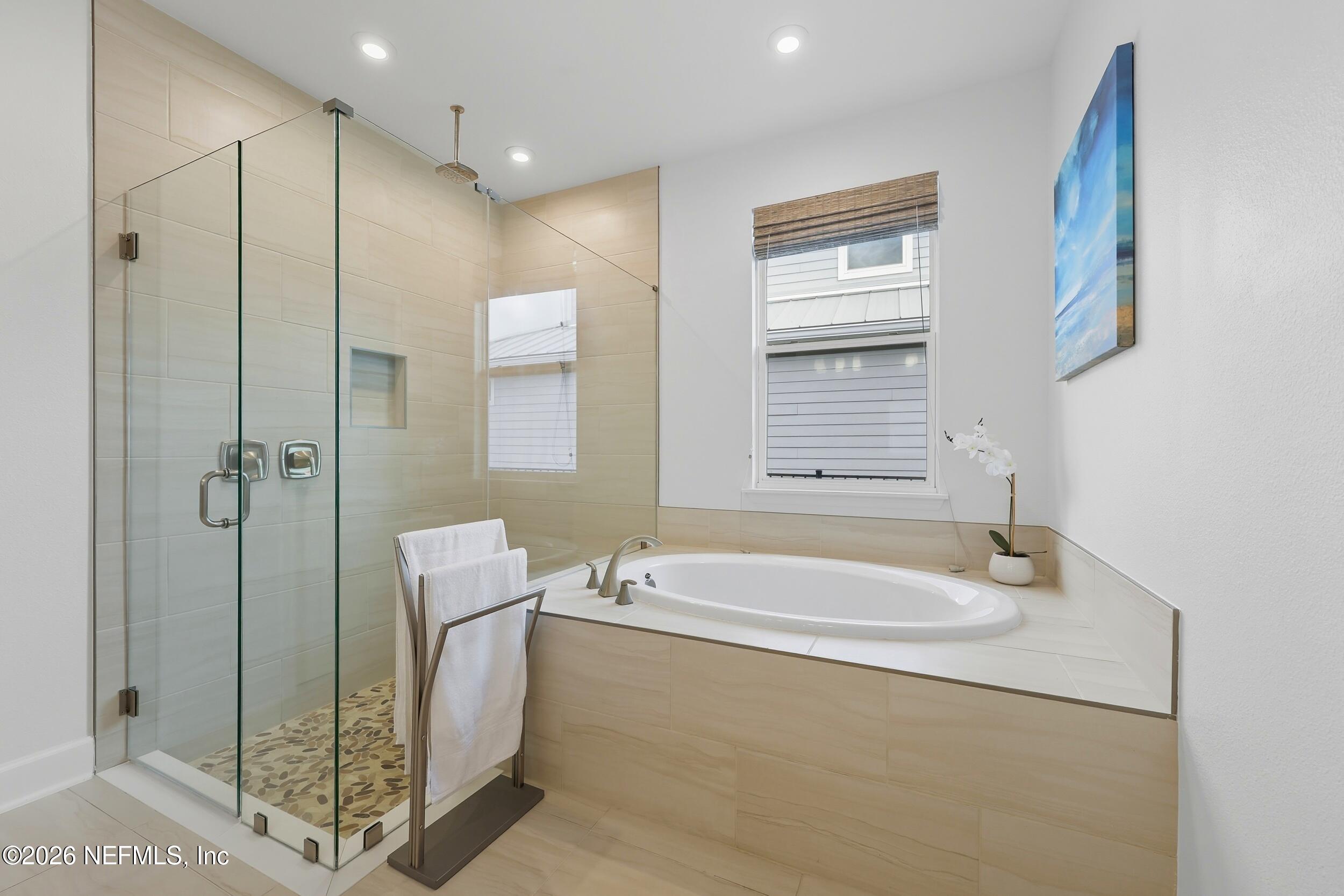 494 Marquesa Circle St. Johns, FL 32259 - Photo 28 of 76 a bathroom with a granite countertop sink a toilet and shower