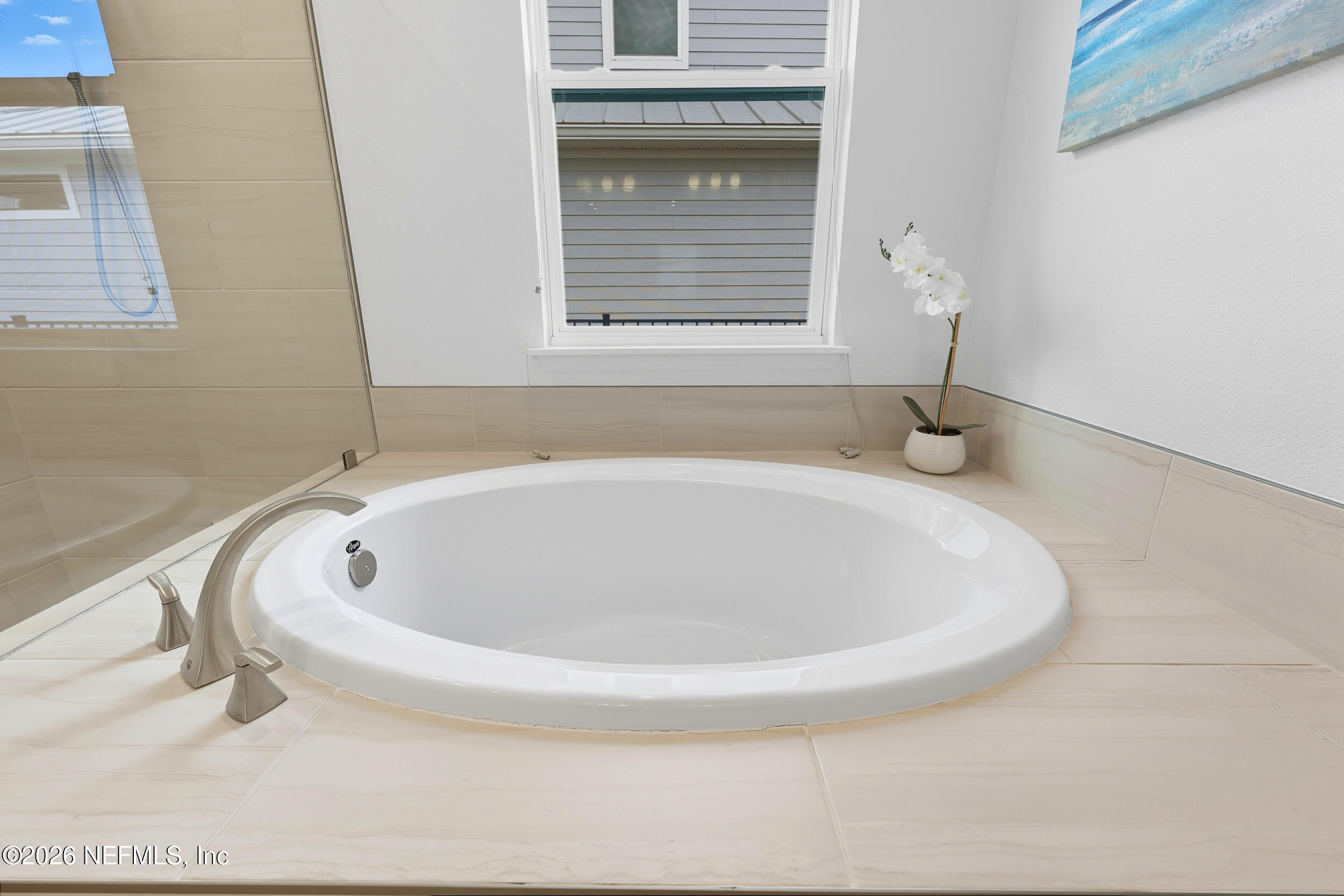 494 Marquesa Circle St. Johns, FL 32259 - Photo 29 of 76 a white bath tub sitting in a bathroom