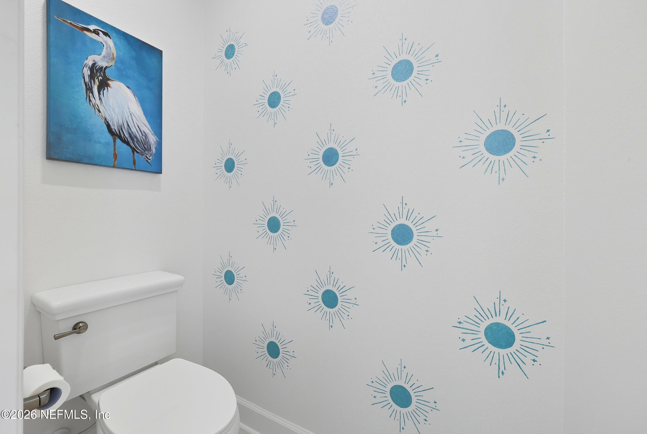 494 Marquesa Circle St. Johns, FL 32259 - Photo 30 of 76 a white toilet sitting next to a shower curtain