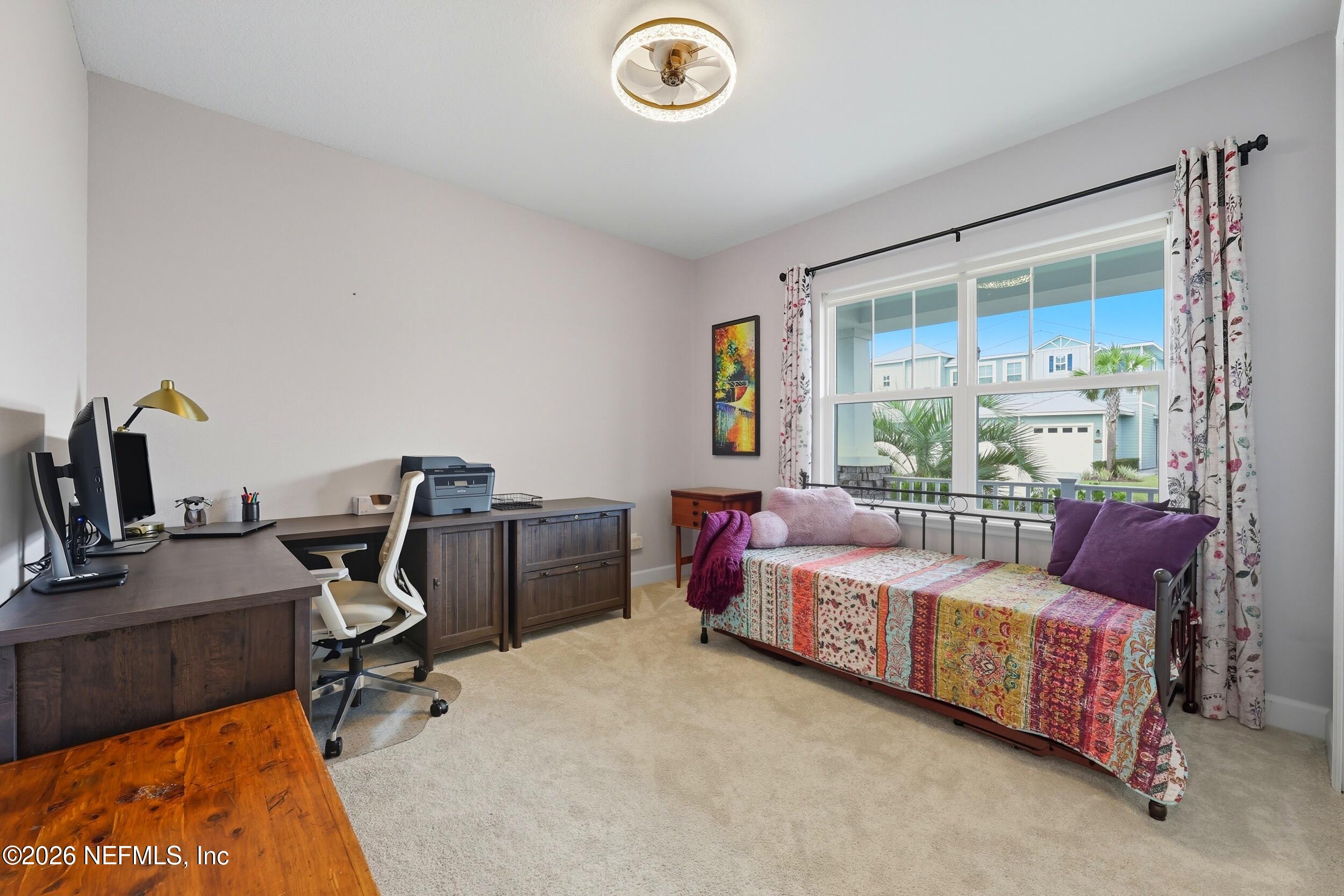 494 Marquesa Circle St. Johns, FL 32259 - Photo 35 of 76 a bedroom with a bed and a desk