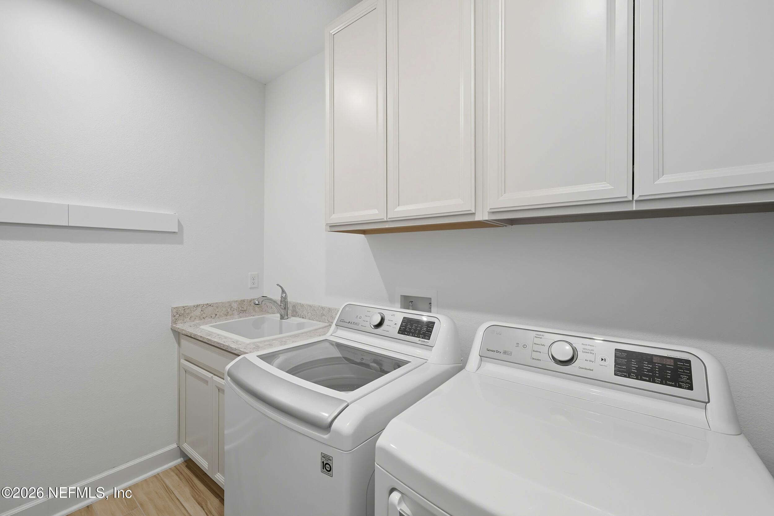 494 Marquesa Circle St. Johns, FL 32259 - Photo 44 of 76 a utility room with dryer and washer