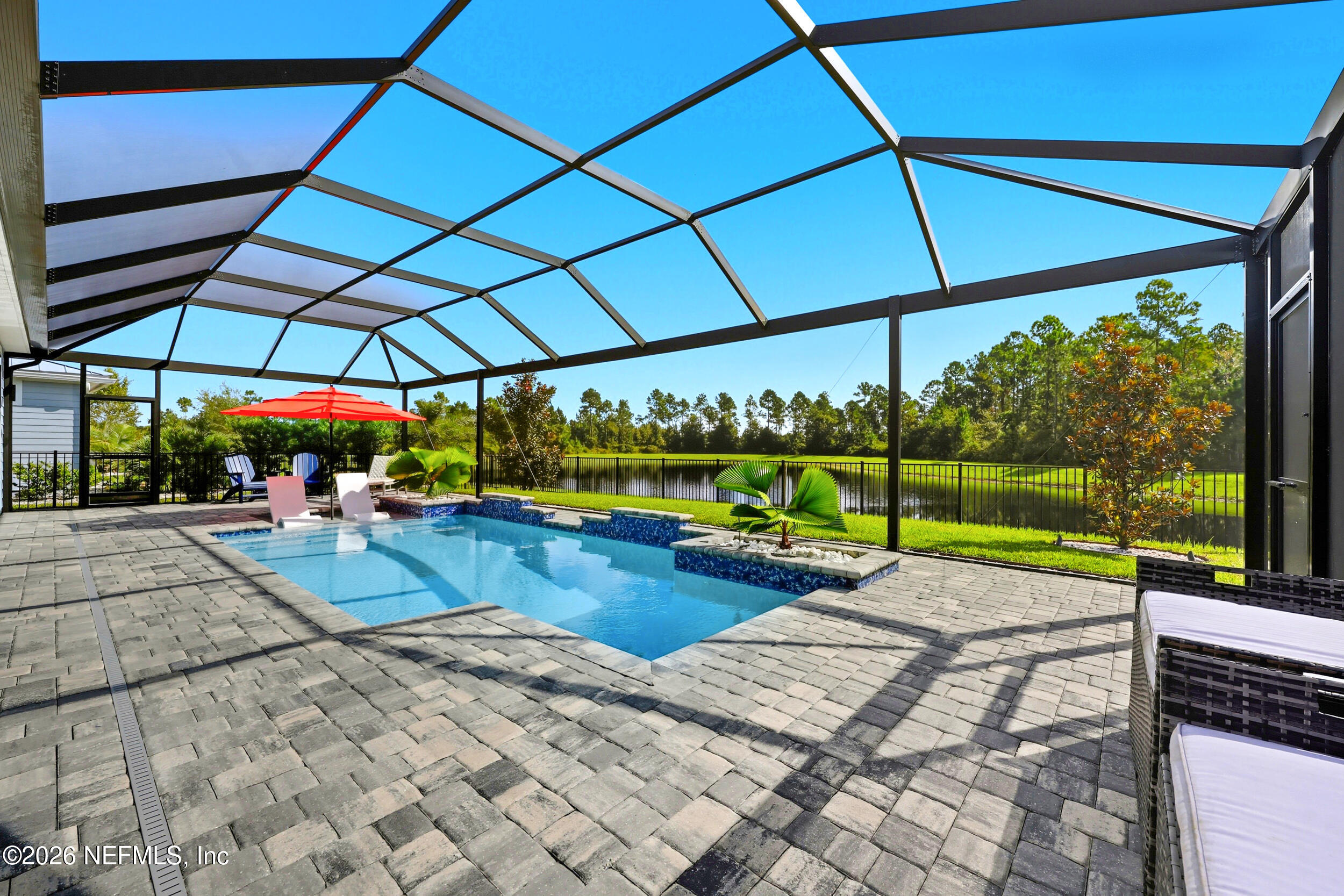 494 Marquesa Circle St. Johns, FL 32259 - Photo 46 of 76 a view of a backyard with swimming pool