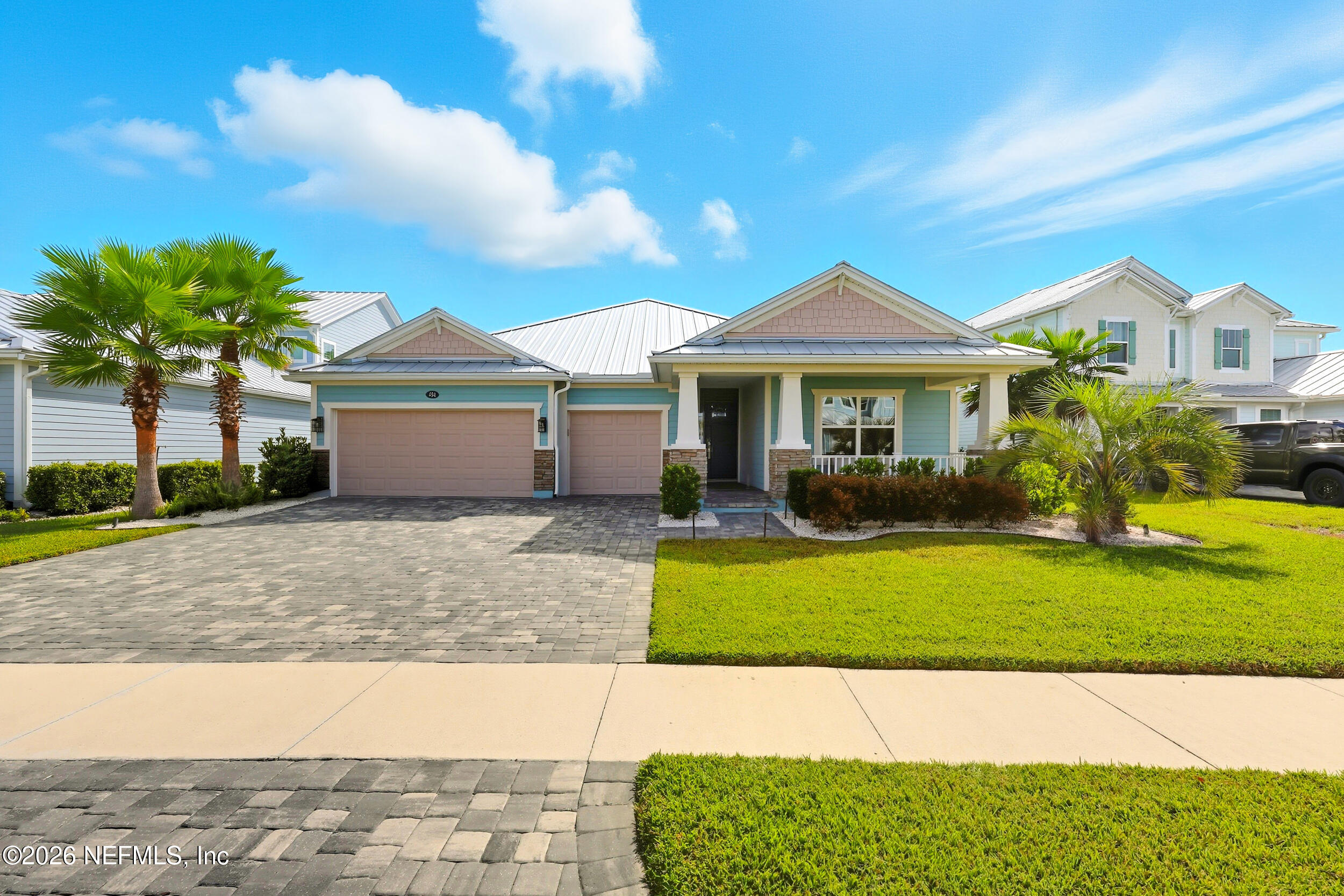 494 Marquesa Circle St. Johns, FL 32259 - Photo 55 of 76 a front view of a house with a garden