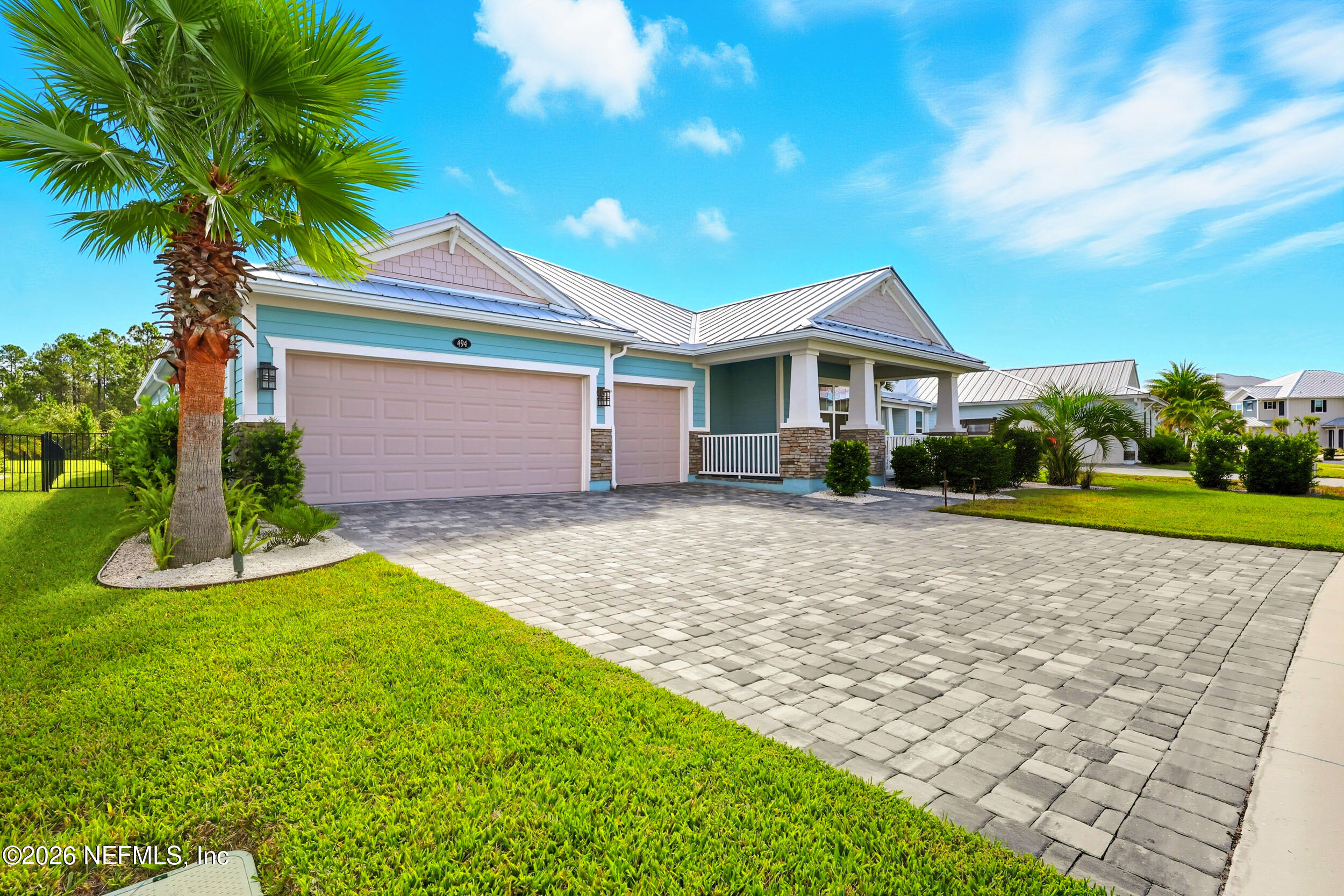 494 Marquesa Circle St. Johns, FL 32259 - Photo 57 of 76 a front view of a house with a yard and garage