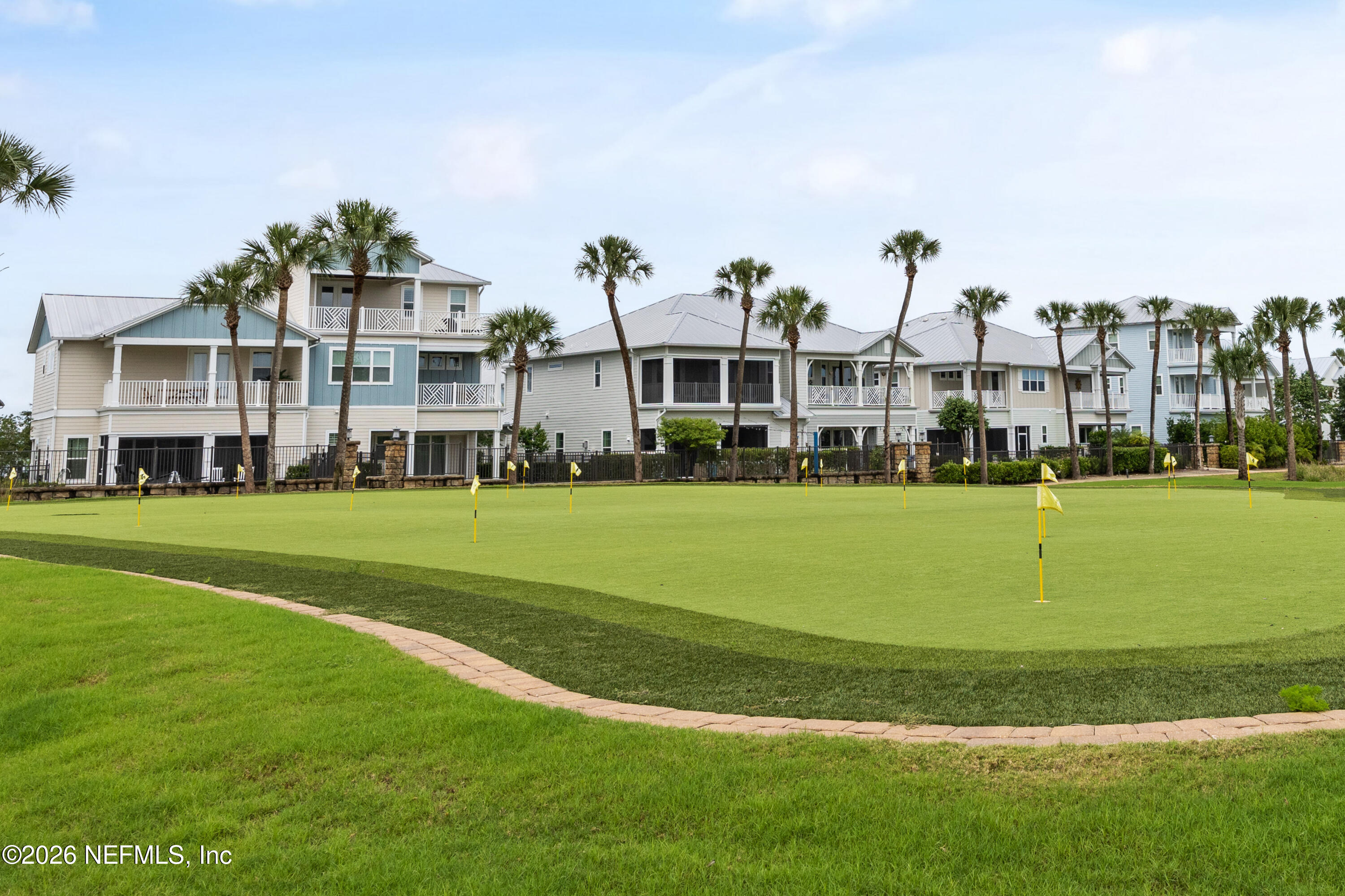 494 Marquesa Circle St. Johns, FL 32259 - Photo 69 of 76 a view of big white house with a yard