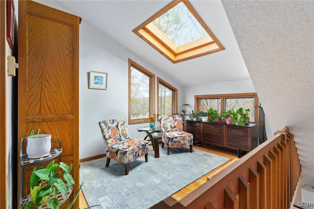 3215 Cherry Ridge Road Bushkill, PA 18324 - Photo 35 of 50 a living room with furniture and a window