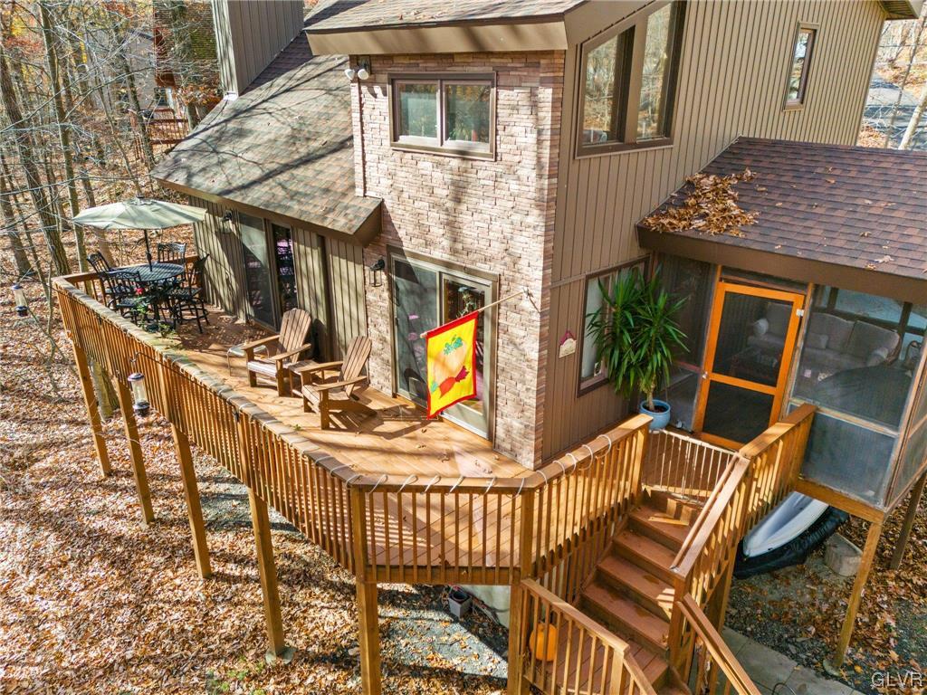 3215 Cherry Ridge Road Bushkill, PA 18324 - Photo 7 of 50 a view of balcony with two chairs and a table