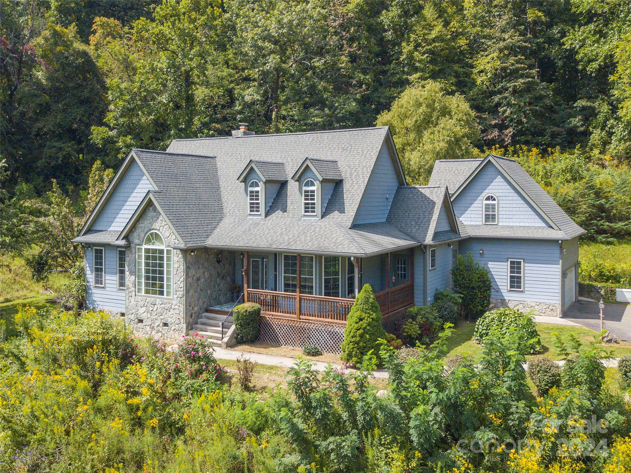 front view of a house with a yard