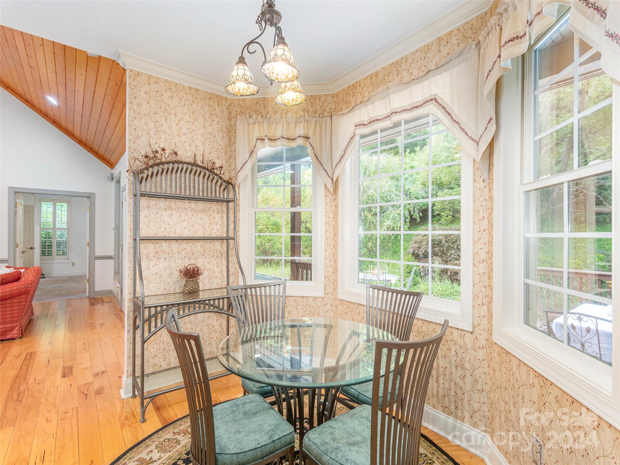 4113 Beaverdam Road Canton, NC 28716 - Photo 16 of 44 a view of a dining room with furniture window and outside view