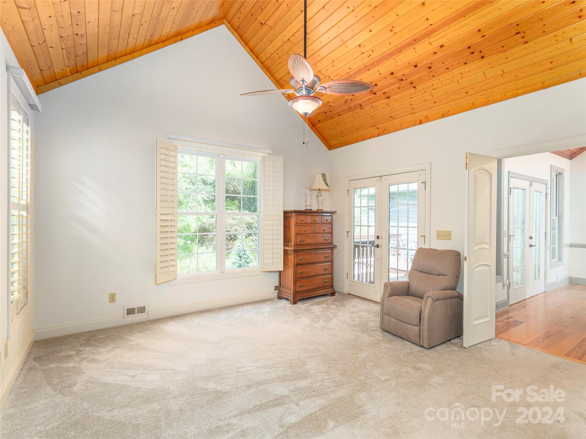 4113 Beaverdam Road Canton, NC 28716 - Photo 17 of 44 a living room with furniture and a open kitchen view