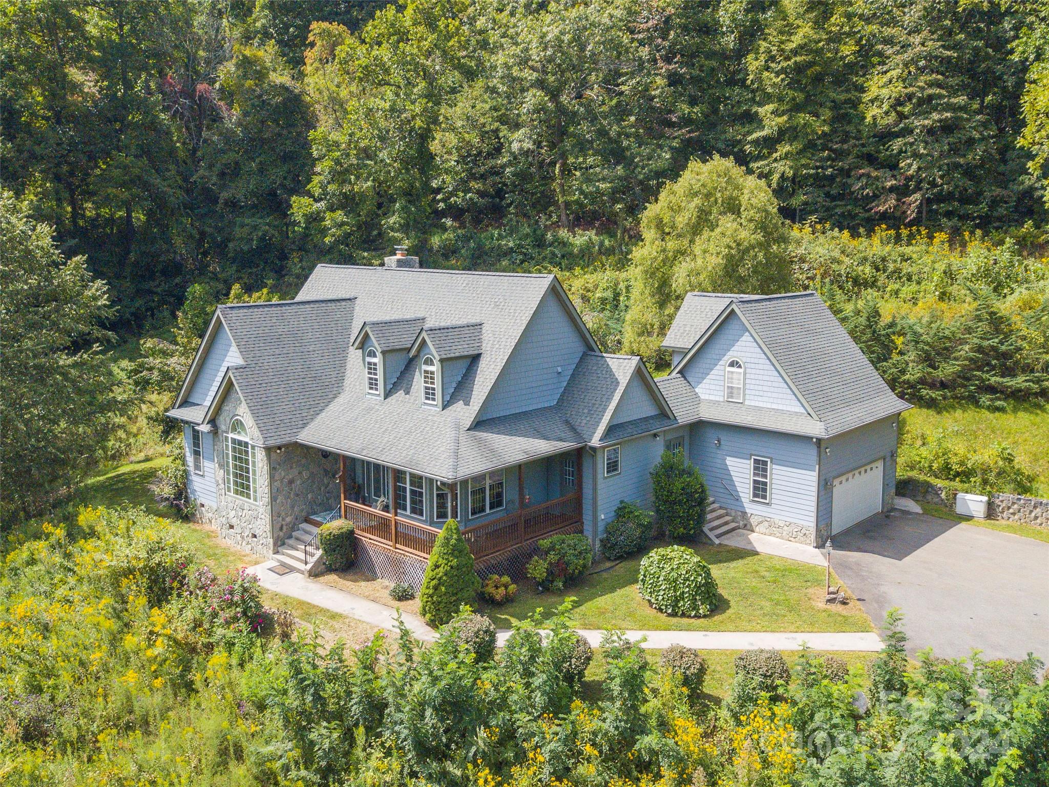 4113 Beaverdam Road Canton, NC 28716 - Photo 2 of 44 front view of a house with a yard