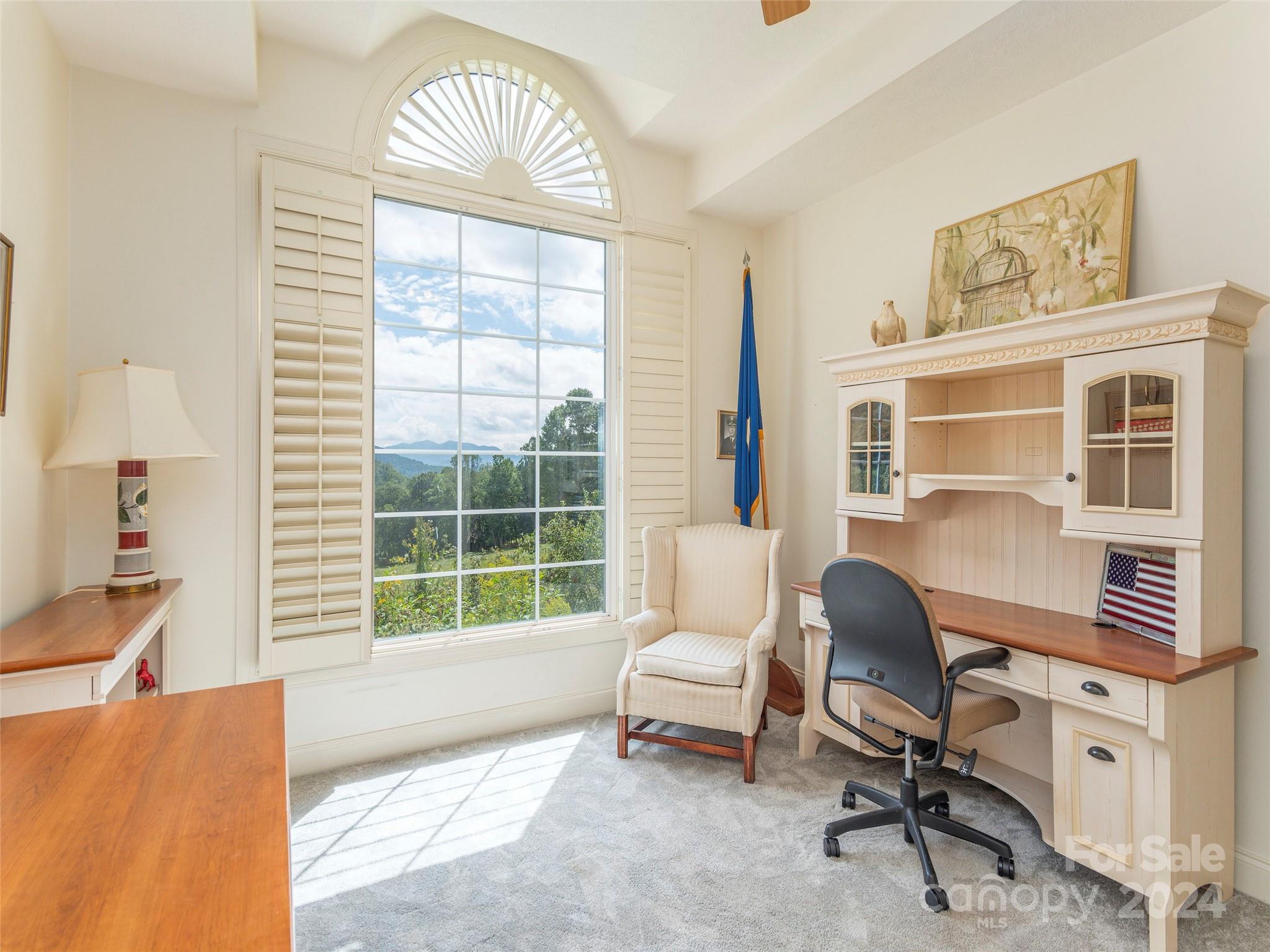 4113 Beaverdam Road Canton, NC 28716 - Photo 22 of 44 a view of a livingroom with workspace and a window