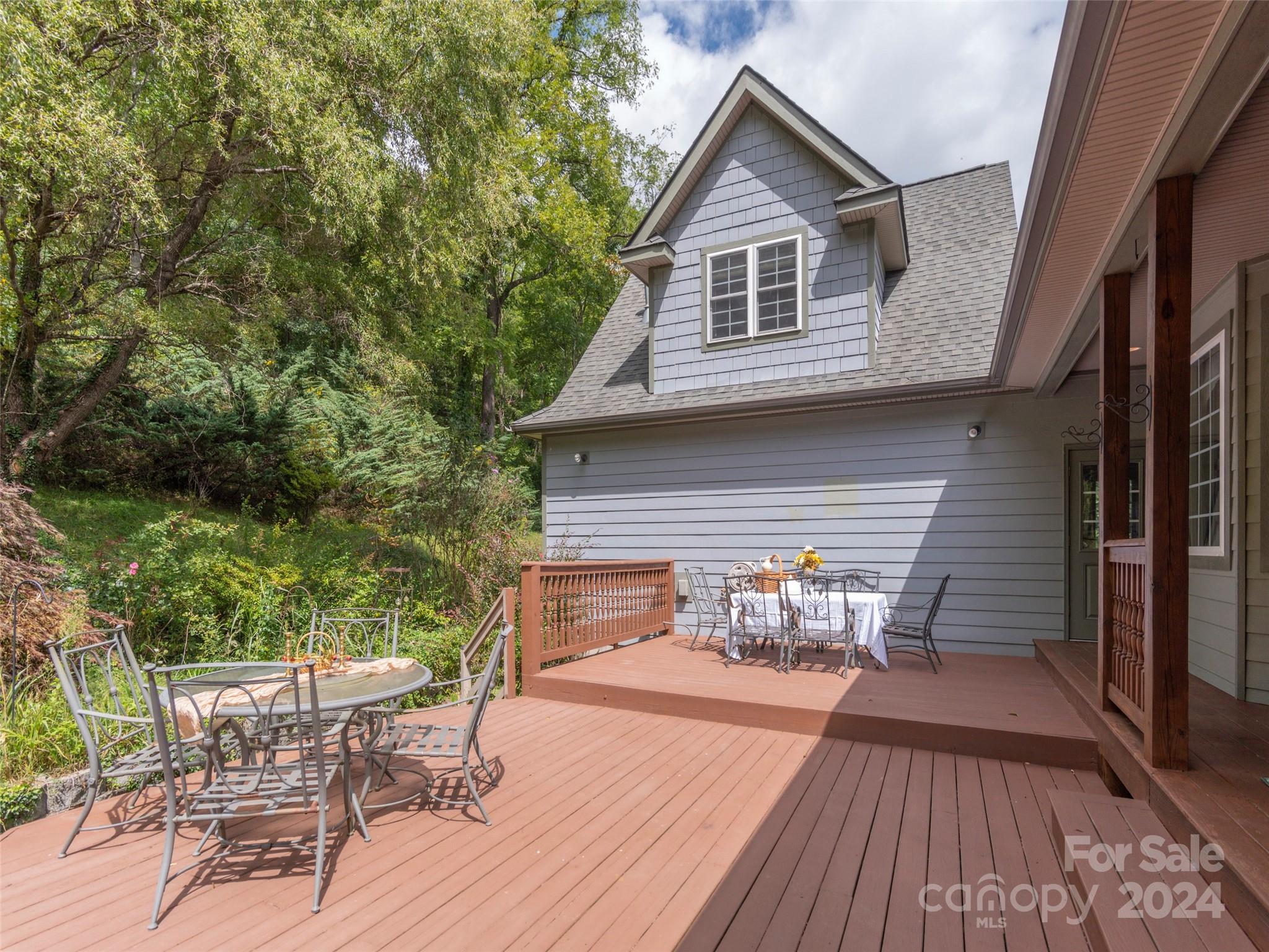 4113 Beaverdam Road Canton, NC 28716 - Photo 32 of 44 a view of outdoor sitting area with furniture and wooden floor