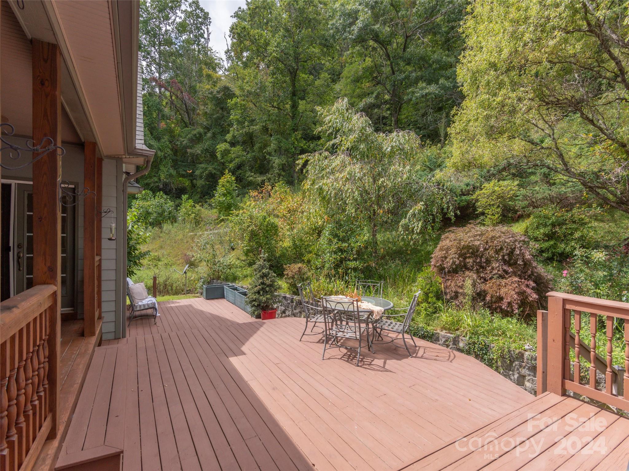 4113 Beaverdam Road Canton, NC 28716 - Photo 33 of 44 a view of a patio with wooden floor