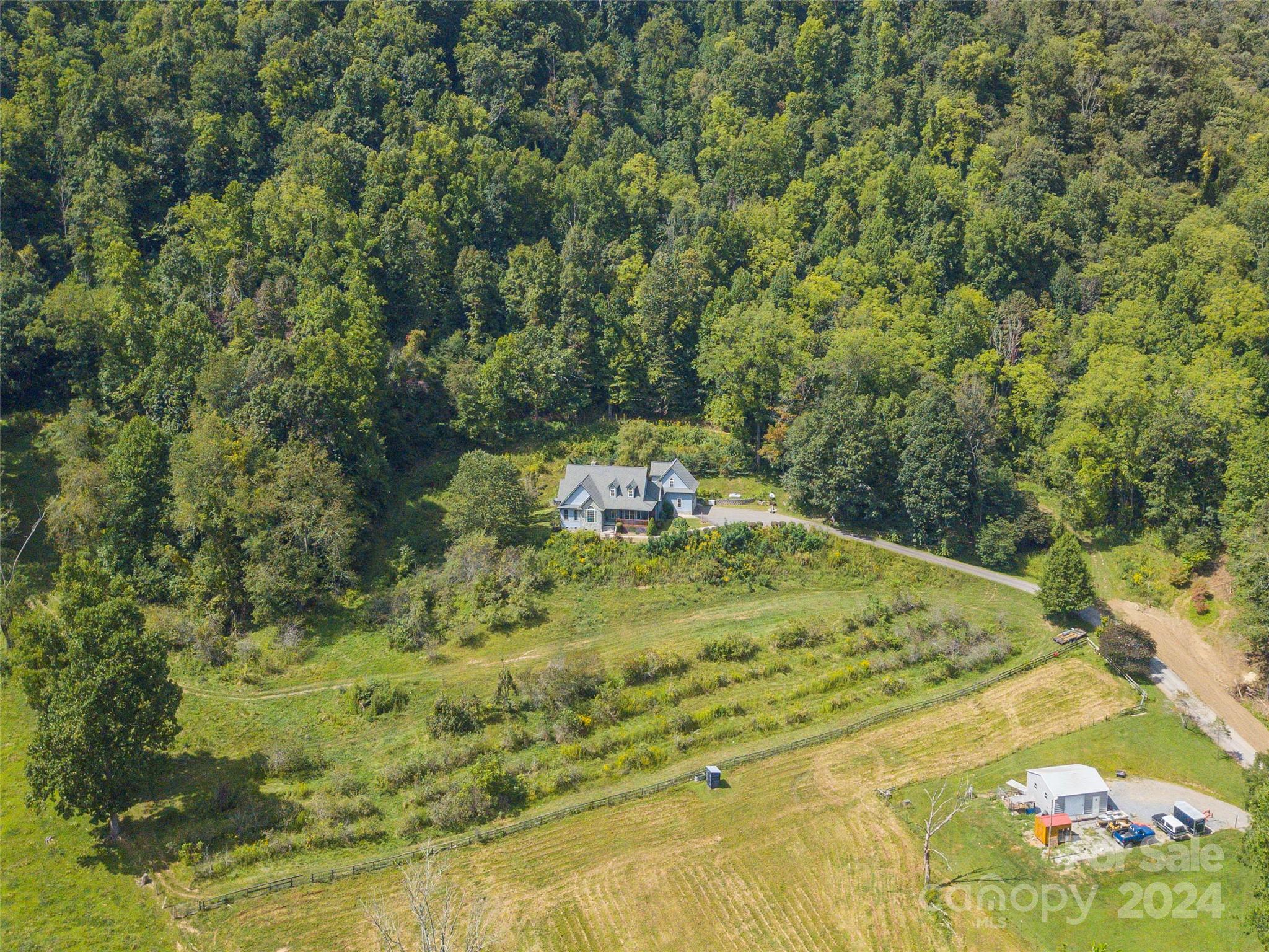 4113 Beaverdam Road Canton, NC 28716 - Photo 41 of 44 a view of a swimming pool with a yard