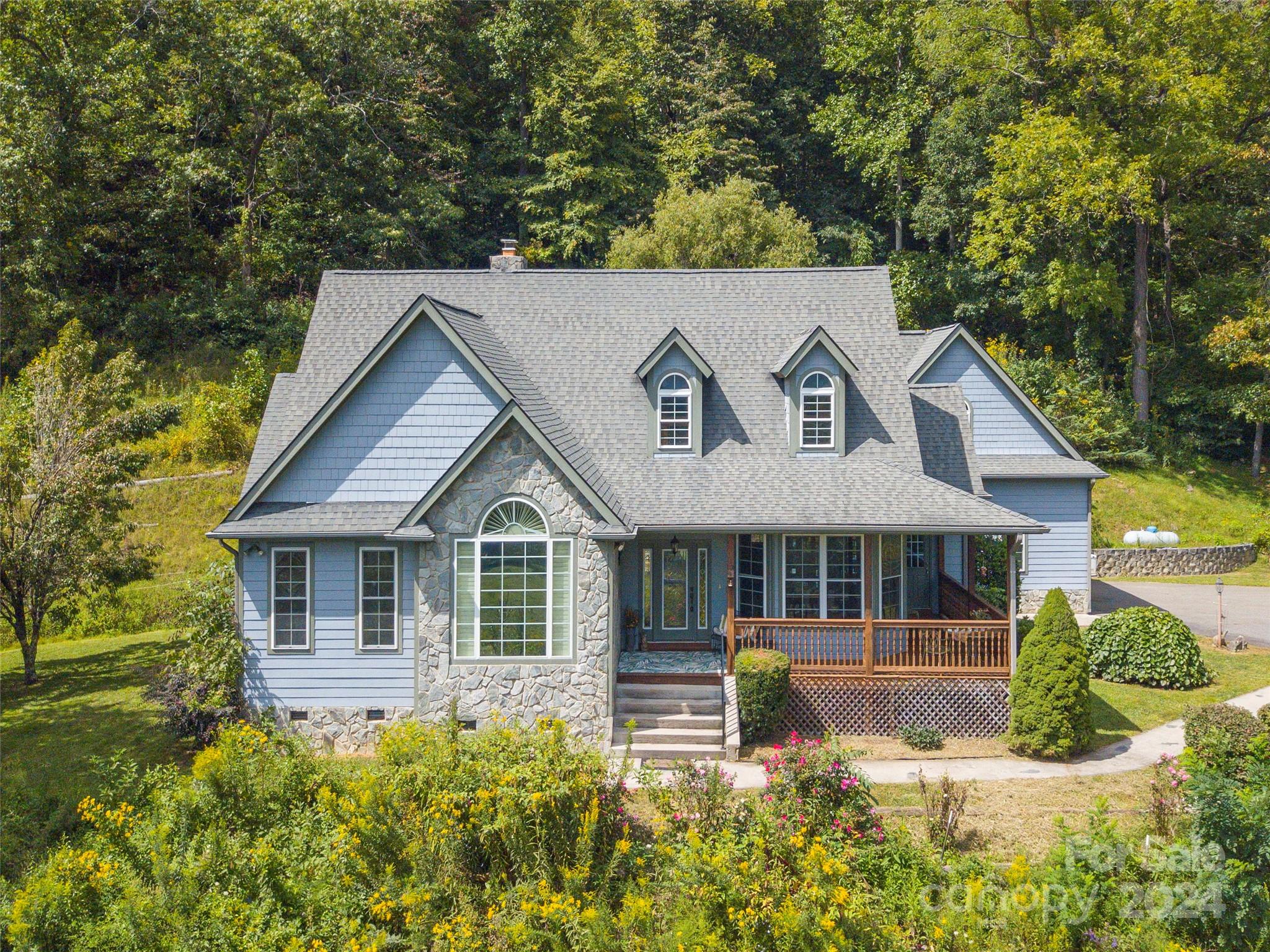 4113 Beaverdam Road Canton, NC 28716 - Photo 43 of 44 a front view of a house with a yard