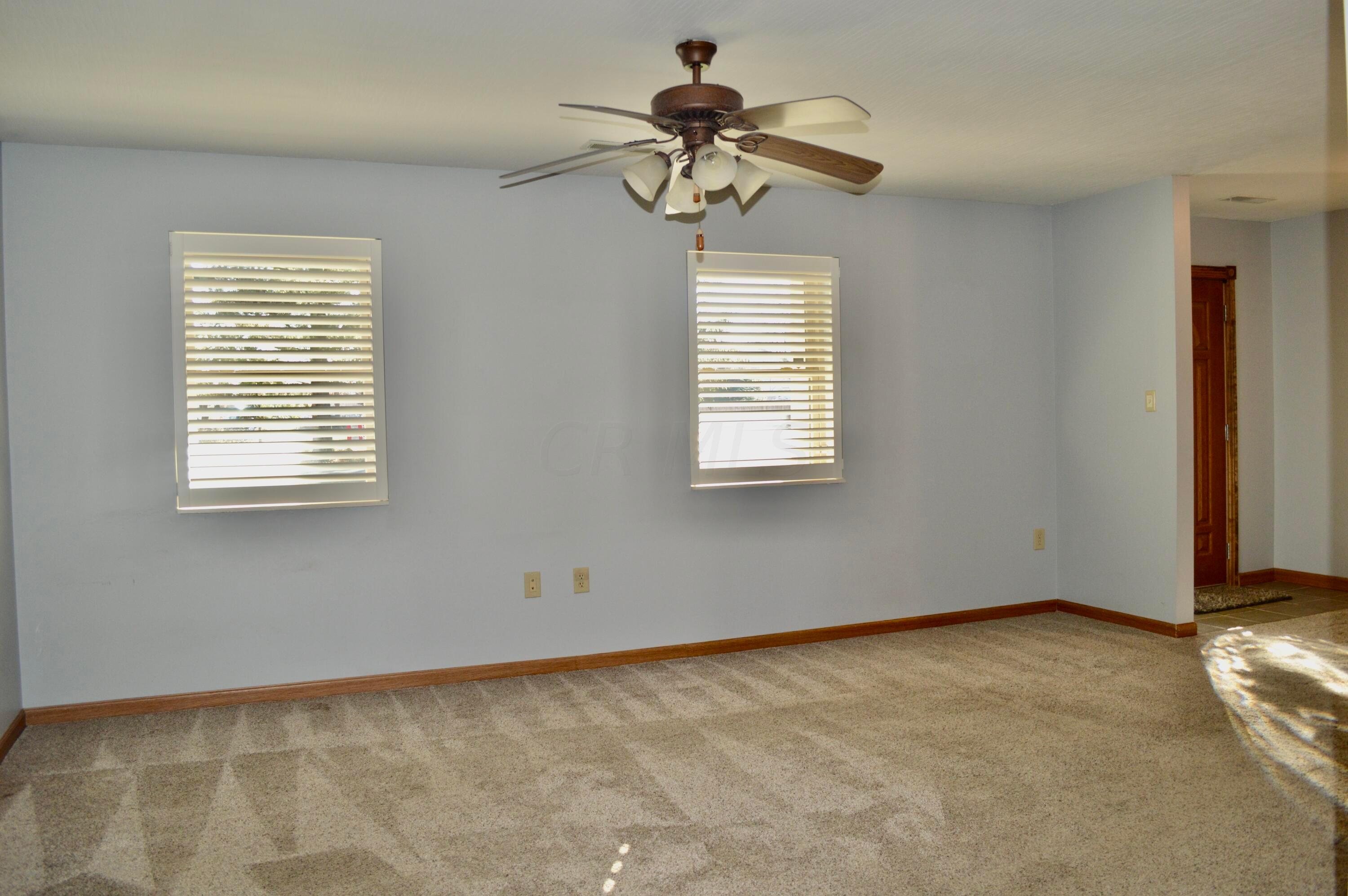 85 Barry Road Southwest Pataskala, OH 43068 - Photo 5 of 30 Spacious Living Room ... There's custom shutters throughout...