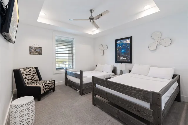 a bedroom with a bed and a couch