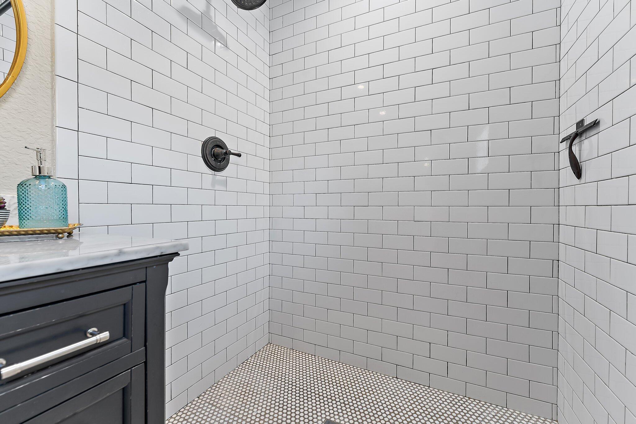 5692 Pennock Point Road Jupiter, FL 33458 - Photo 27 of 51 a bathroom with a shower