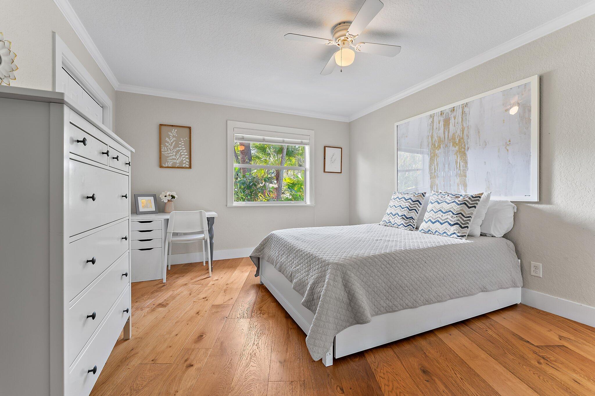 5692 Pennock Point Road Jupiter, FL 33458 - Photo 29 of 51 a bedroom with a bed and a window