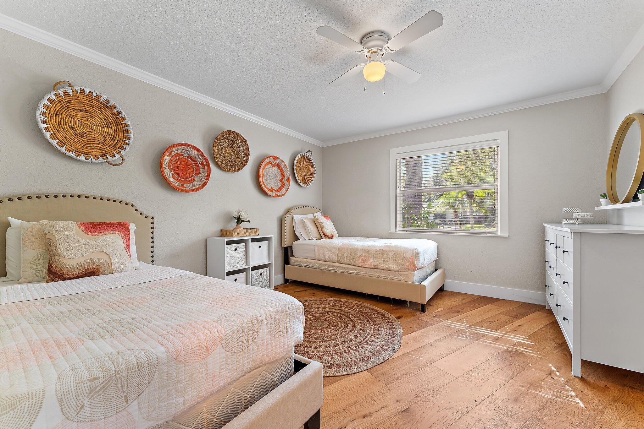 5692 Pennock Point Road Jupiter, FL 33458 - Photo 35 of 51 a bedroom with a bed and a window