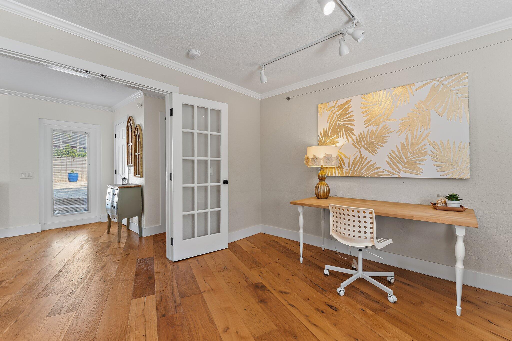 5692 Pennock Point Road Jupiter, FL 33458 - Photo 38 of 51 a view of a livingroom with wooden floor and furniture
