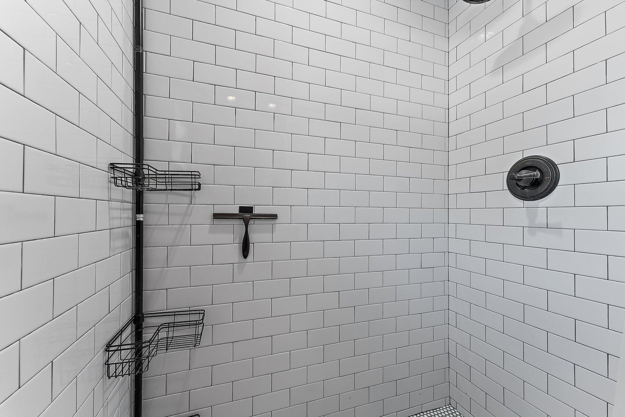 5692 Pennock Point Road Jupiter, FL 33458 - Photo 40 of 51 a bathroom with a shower