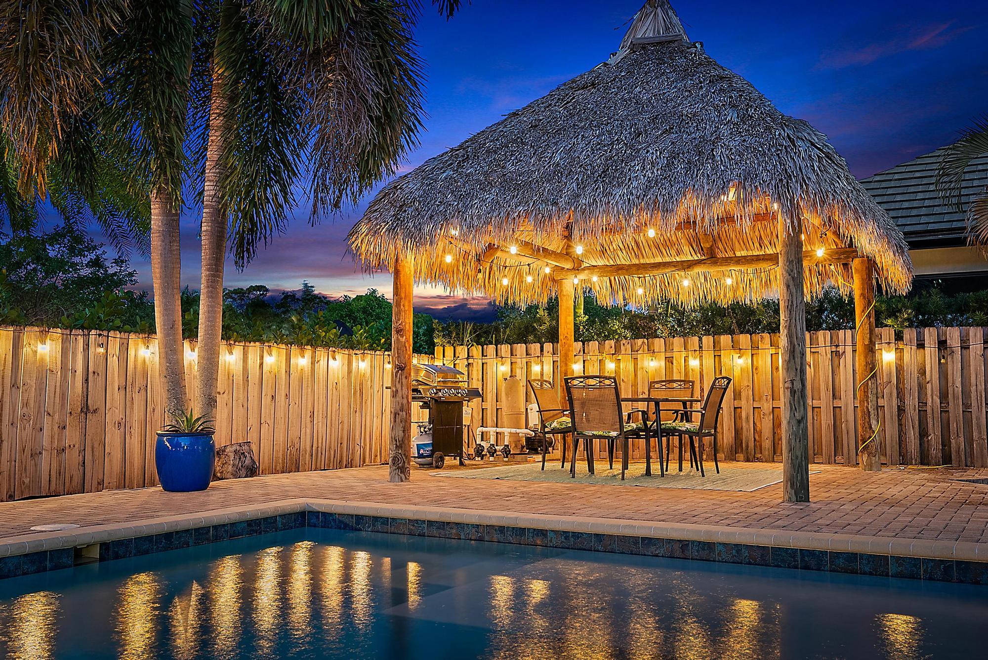 5692 Pennock Point Road Jupiter, FL 33458 - Photo 4 of 51 a view of swimming pool with chairs