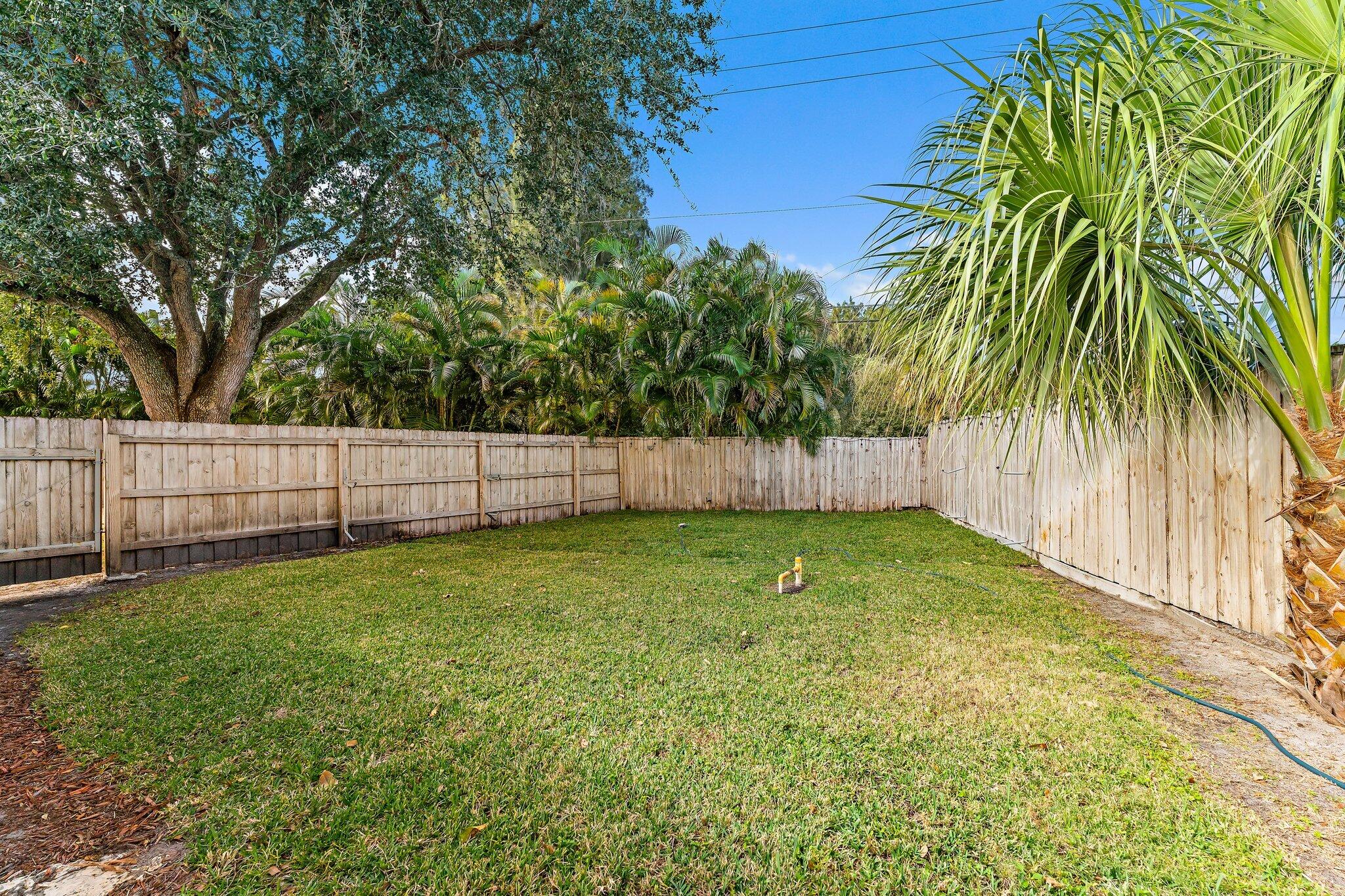 5692 Pennock Point Road Jupiter, FL 33458 - Photo 46 of 51 a view of outdoor space and yard